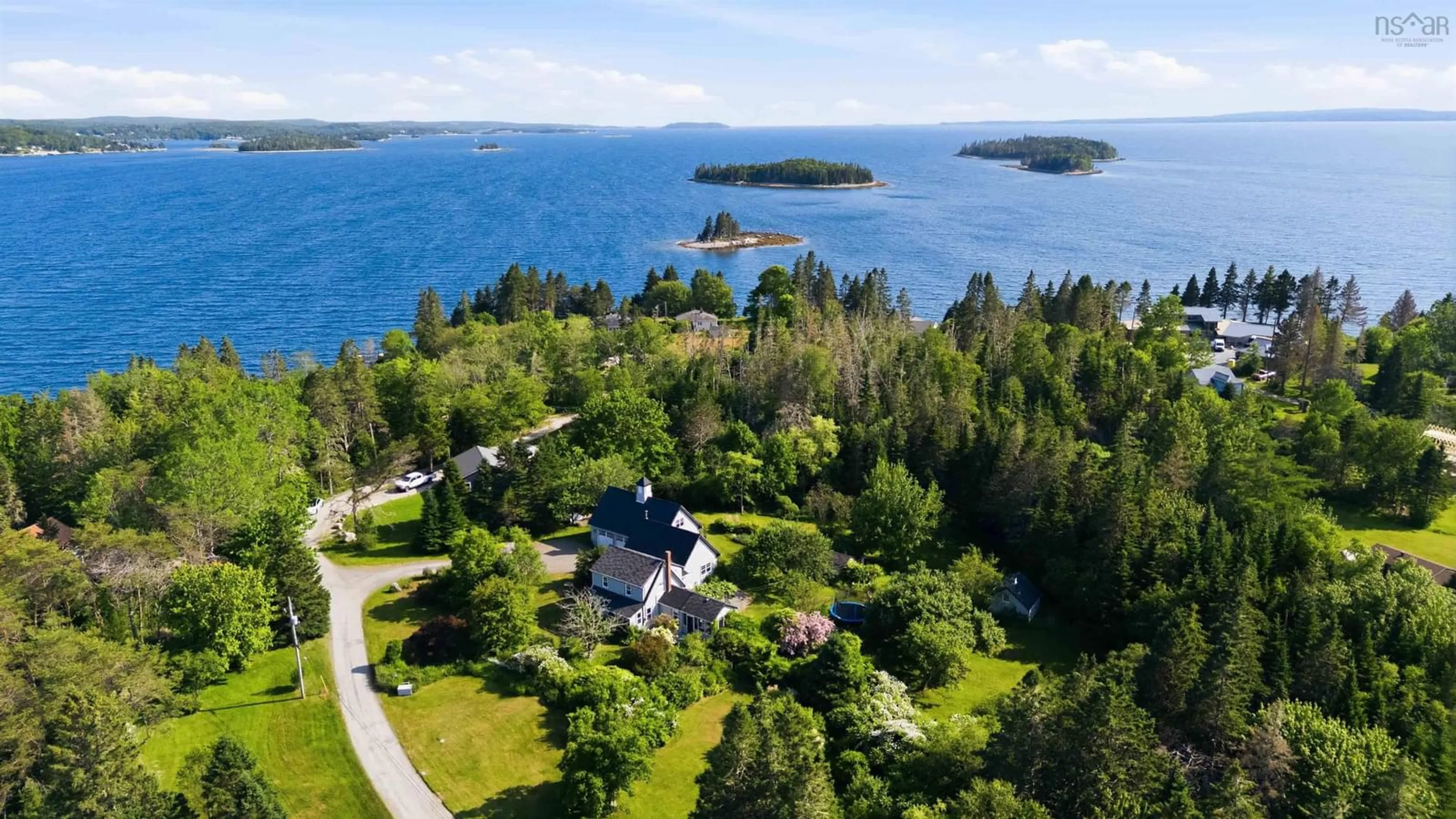 A pic from outside/outdoor area/front of a property/back of a property/a pic from drone, water/lake/river/ocean view for 295 Kennedys Rd, Boutiliers Point Nova Scotia B4B 0M3