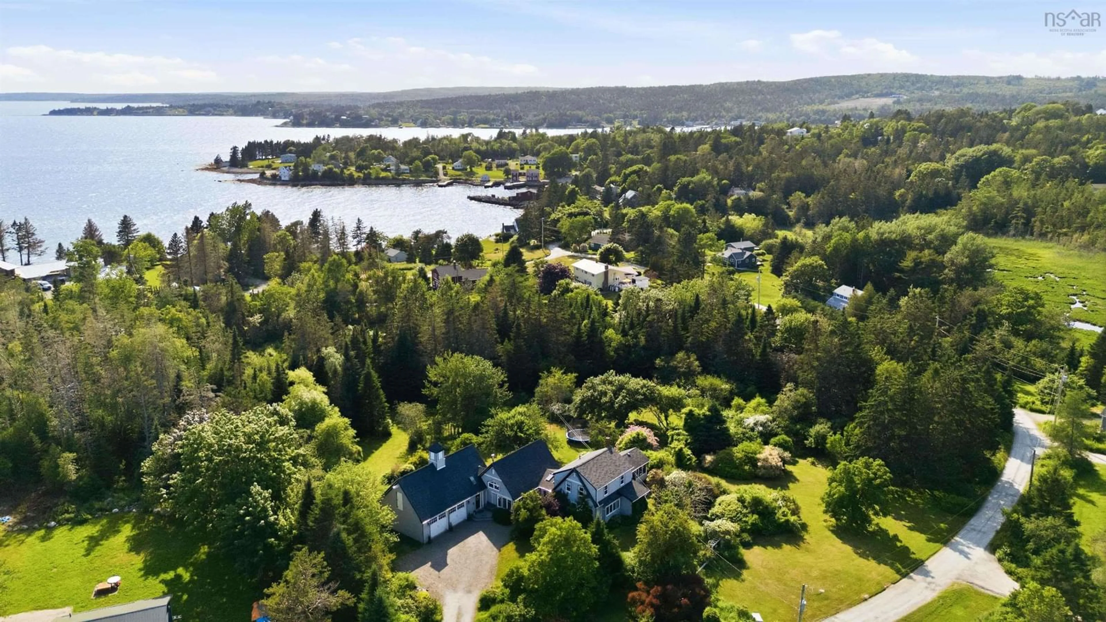 A pic from outside/outdoor area/front of a property/back of a property/a pic from drone, water/lake/river/ocean view for 295 Kennedys Rd, Boutiliers Point Nova Scotia B4B 0M3