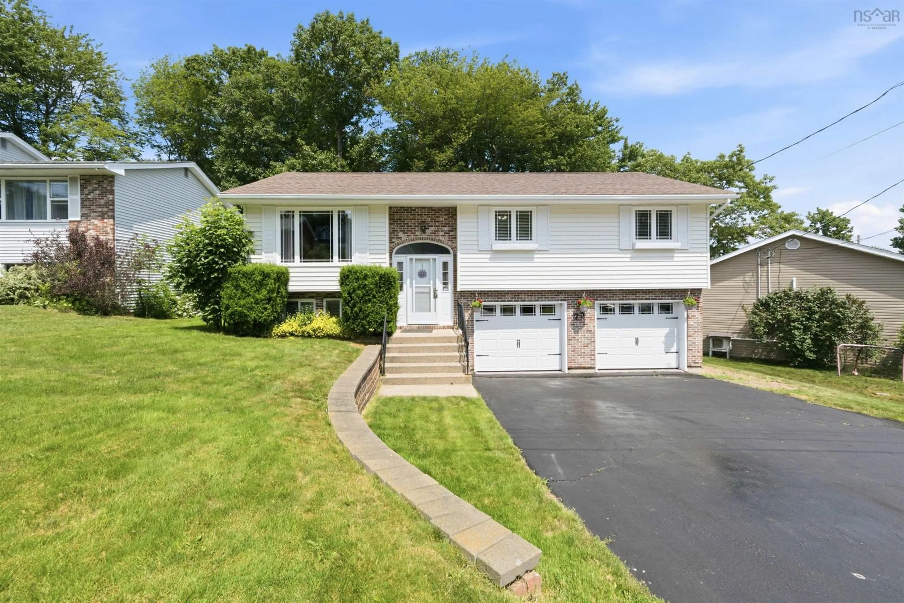 Home with vinyl exterior material, street for 73 Wynn Castle Dr, Lower Sackville Nova Scotia B4E 2H3