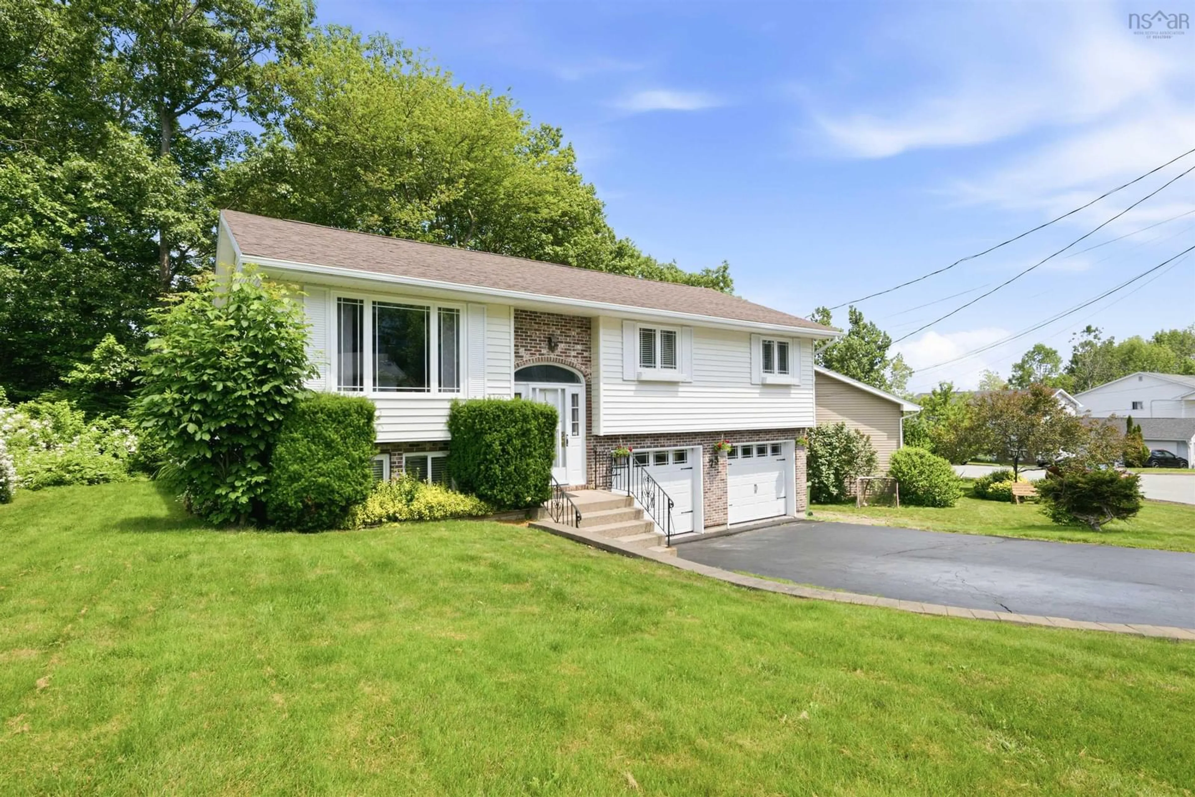 Home with vinyl exterior material, street for 73 Wynn Castle Dr, Lower Sackville Nova Scotia B4E 2H3
