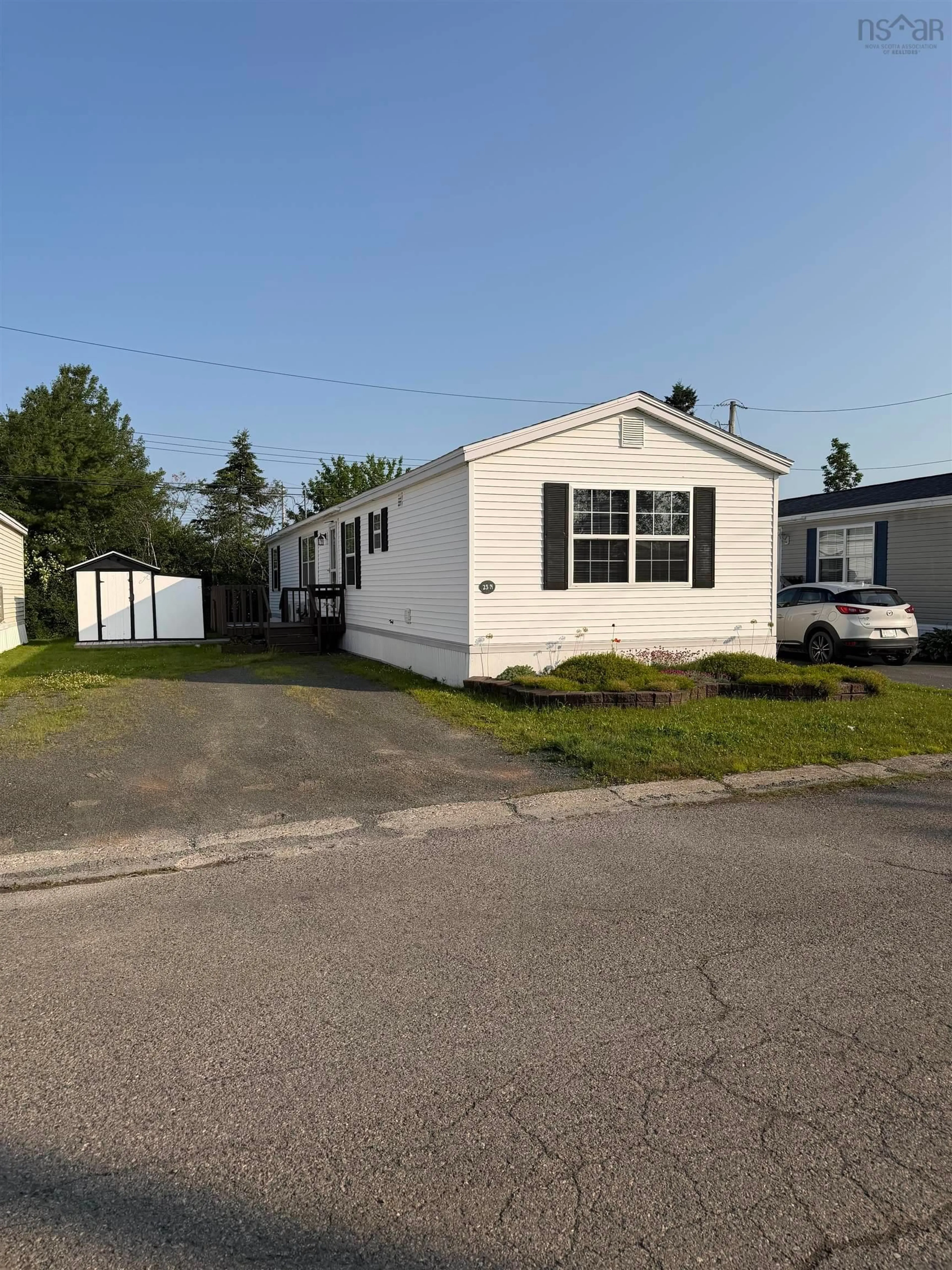 Home with vinyl exterior material, street for 23 Shamrock North  B2g 1c9, Antigonish Nova Scotia B2G 1C9