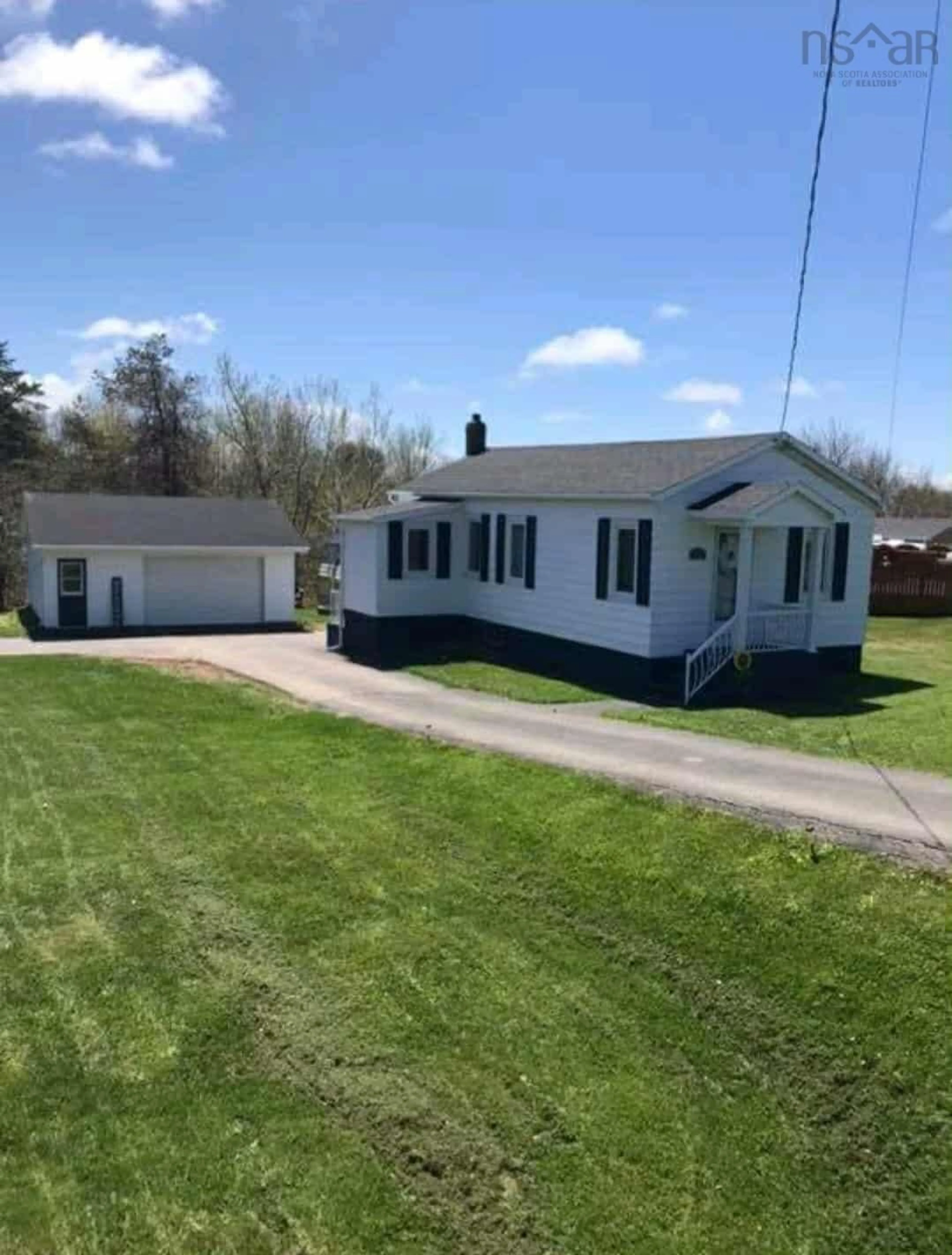 A pic from outside/outdoor area/front of a property/back of a property/a pic from drone, building for 2144 Sydney Rd, Reserve Mines Nova Scotia B1E 1K1