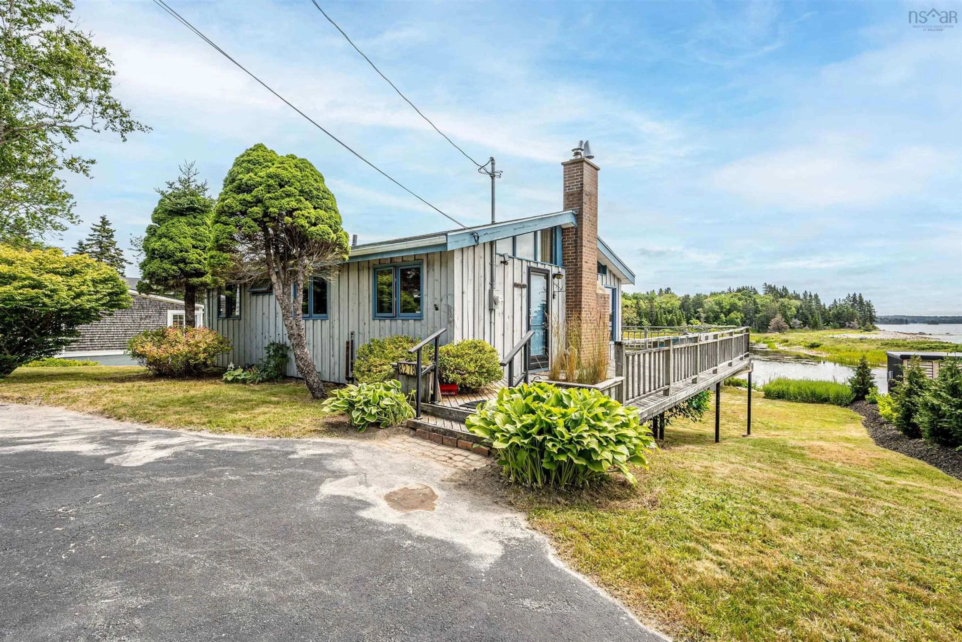 A pic from outside/outdoor area/front of a property/back of a property/a pic from drone, water/lake/river/ocean view for 8278 St Margarets Bay Rd, Black Point Nova Scotia B0J 0C2