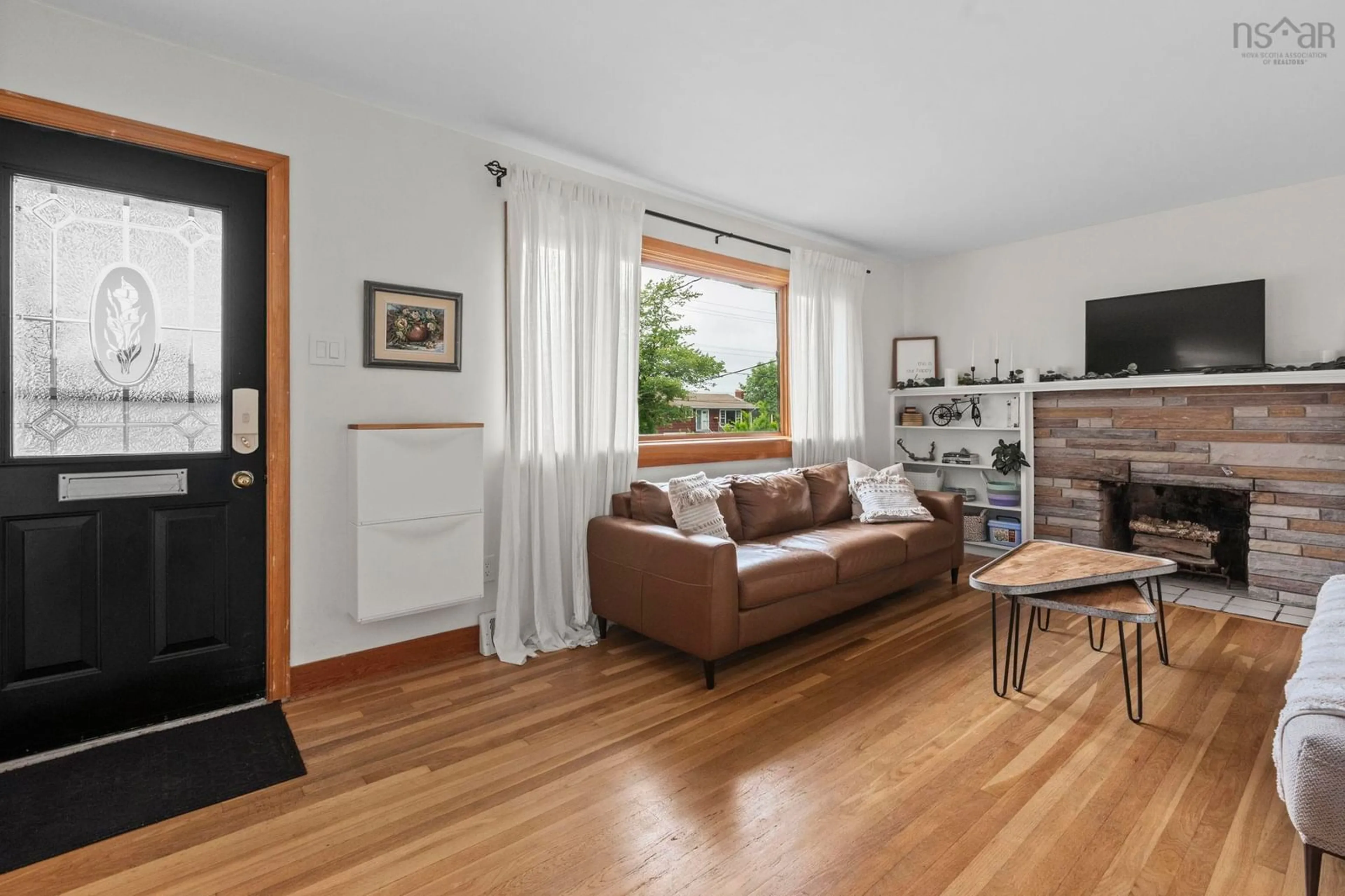 Living room with furniture, wood/laminate floor for 122 Sunnybrae Ave, Halifax Nova Scotia B3N 2H1
