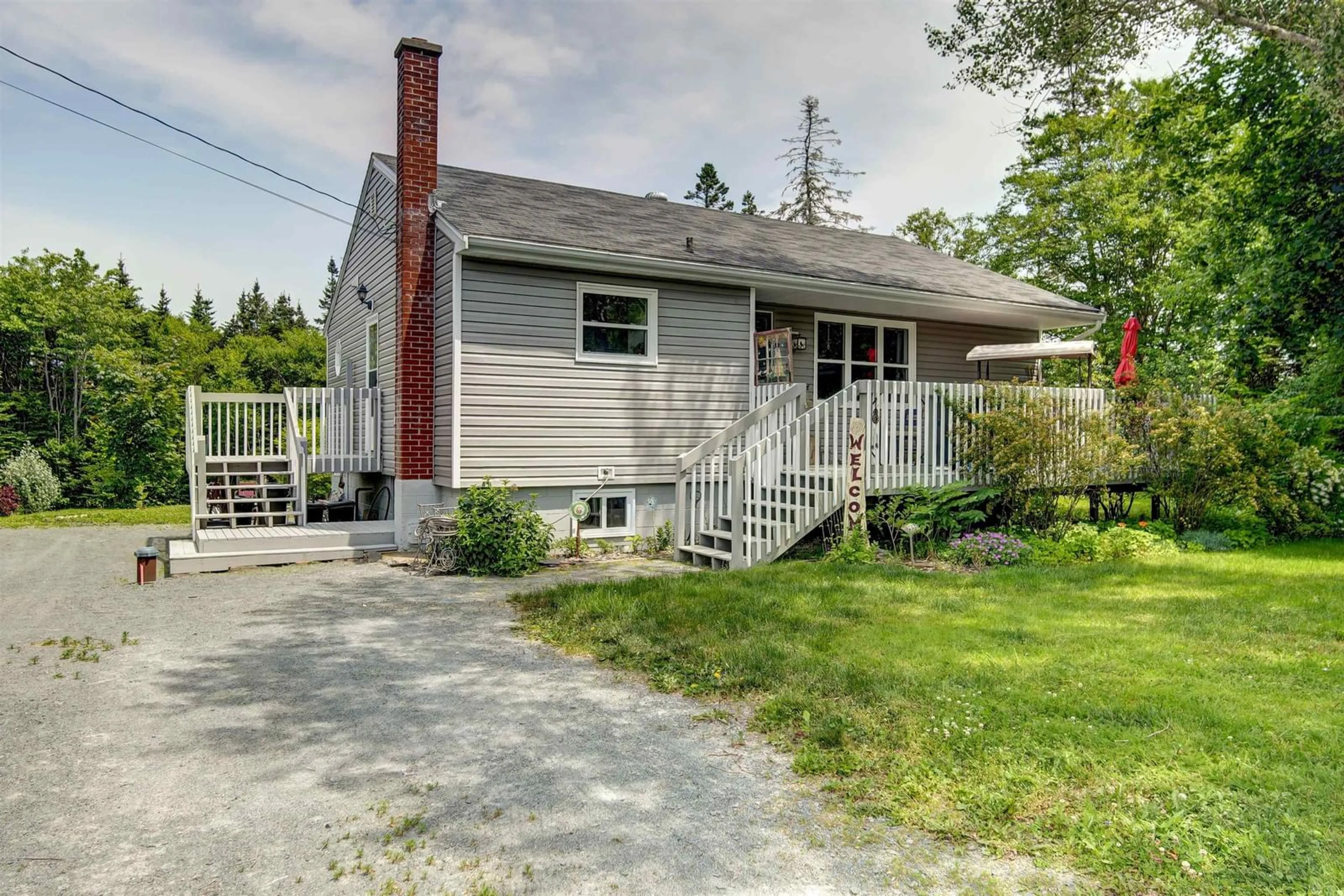 Home with vinyl exterior material, street for 24 All Hallows Rd, Whites Lake Nova Scotia B3T 1W3