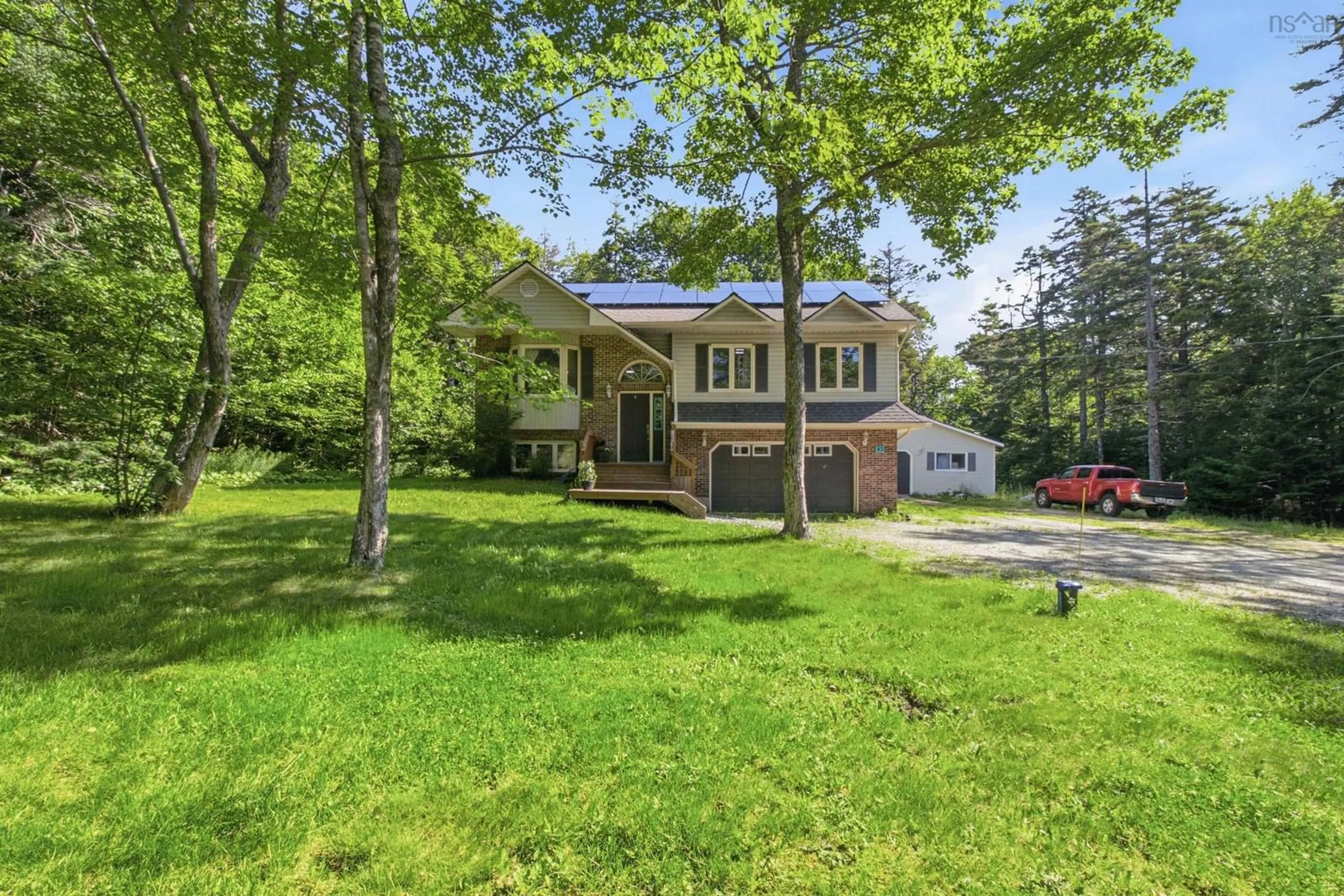 A pic from outside/outdoor area/front of a property/back of a property/a pic from drone, unknown for 45 Rockcliffe Cres, Hammonds Plains Nova Scotia B3Z 1J8