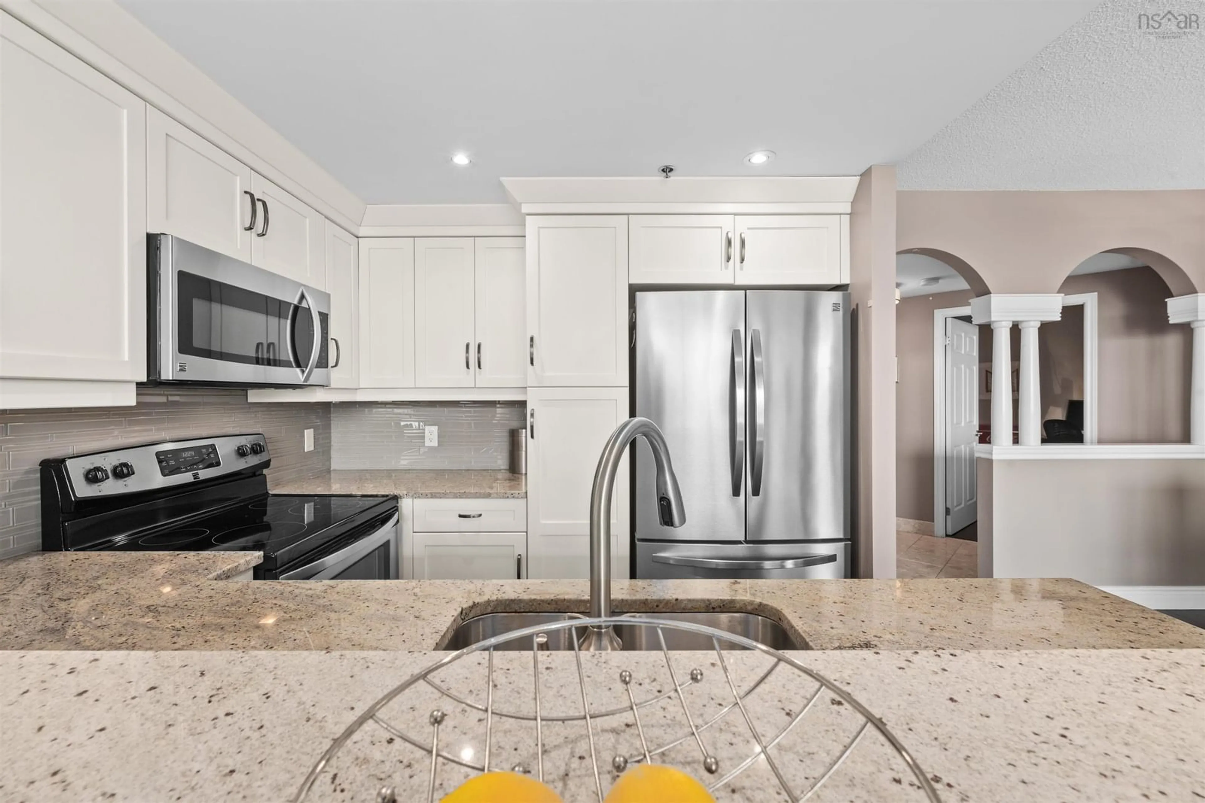 Open concept kitchen, ceramic/tile floor for 1465 Brenton St #1103, Halifax Nova Scotia B3J 1H1