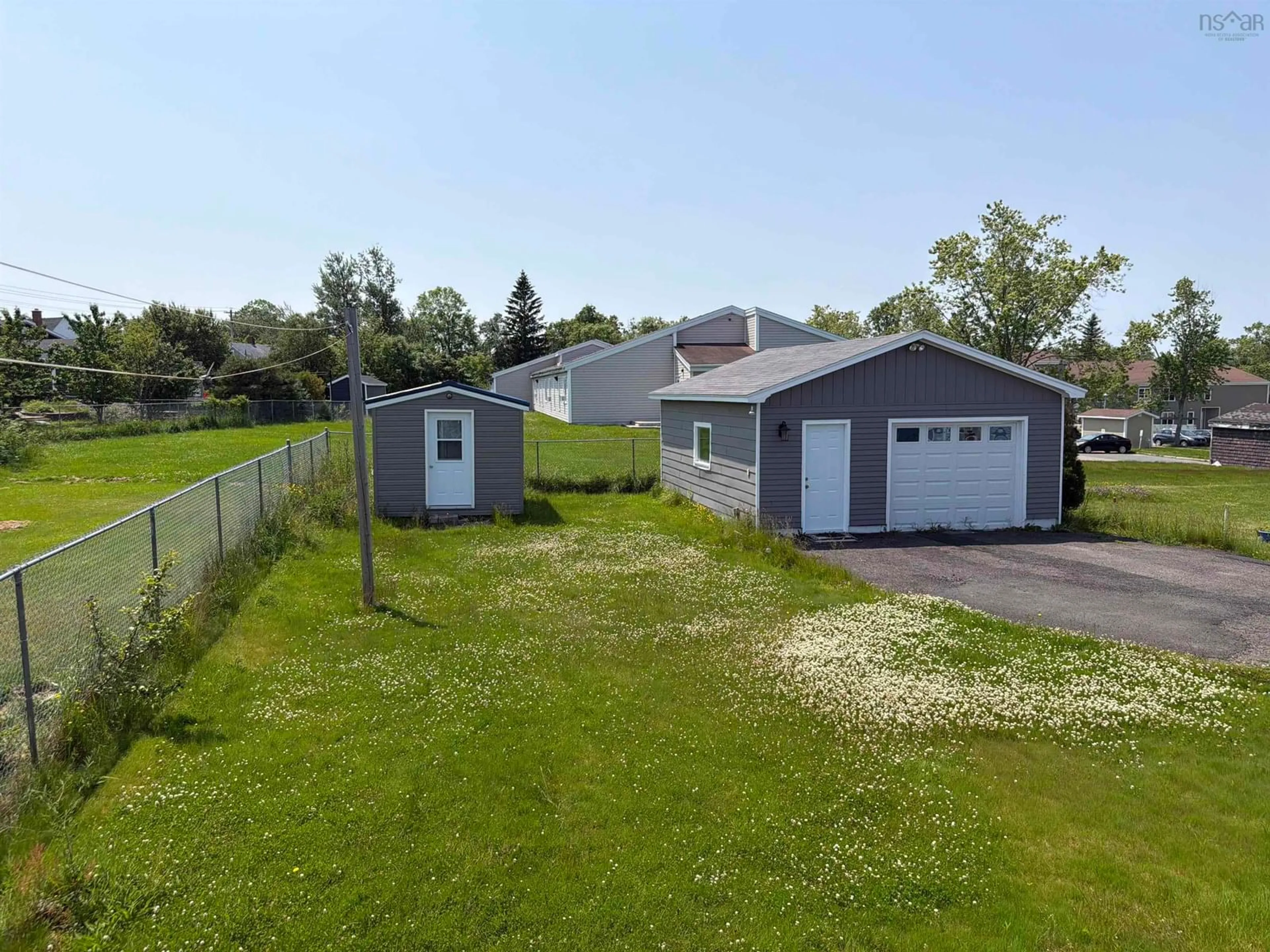 A pic from outside/outdoor area/front of a property/back of a property/a pic from drone, street for 84 Tillock Dr, Sydney Nova Scotia B1P 6R1