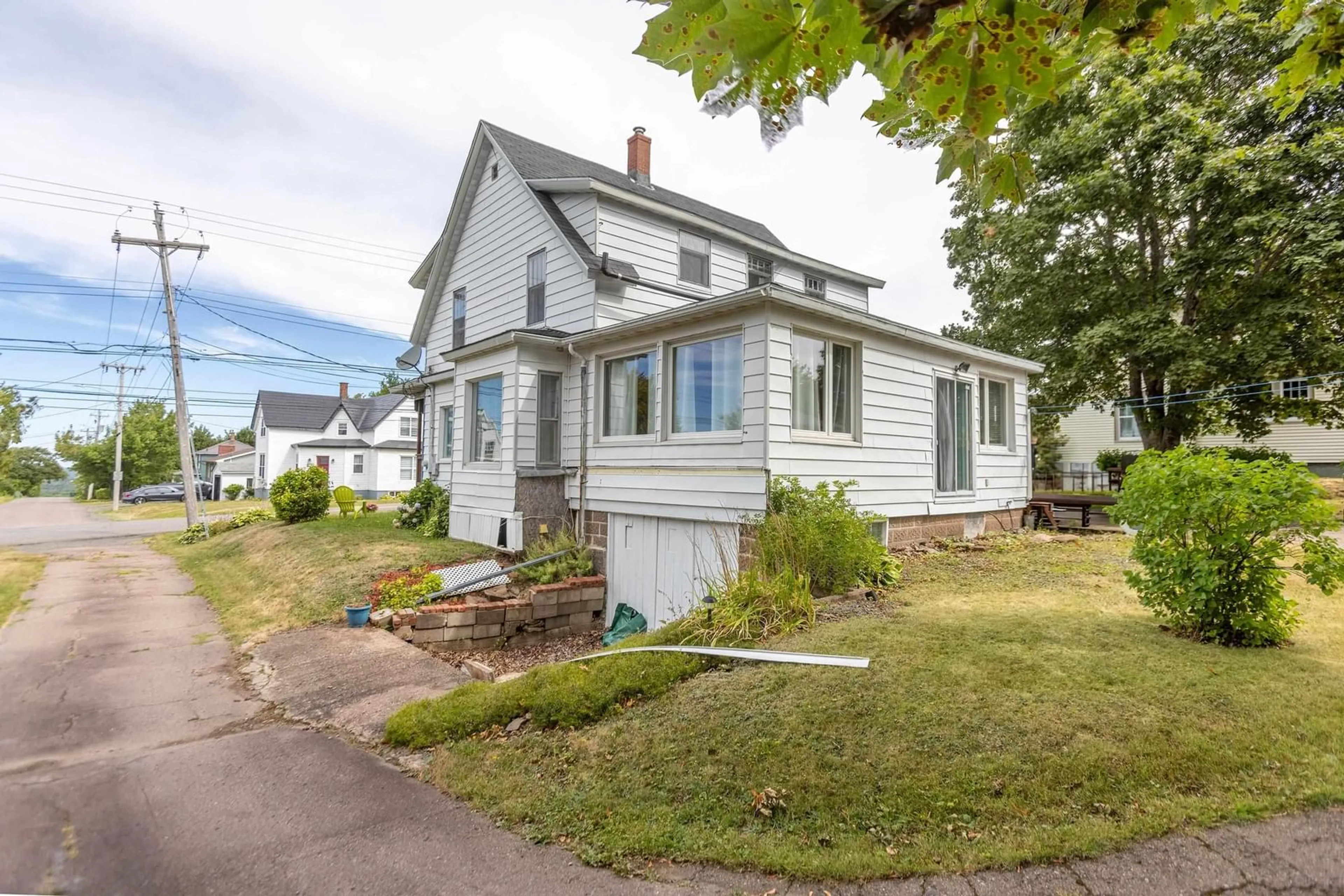 Home with vinyl exterior material, street for 137 Main St, Springhill Nova Scotia B0M 1X0