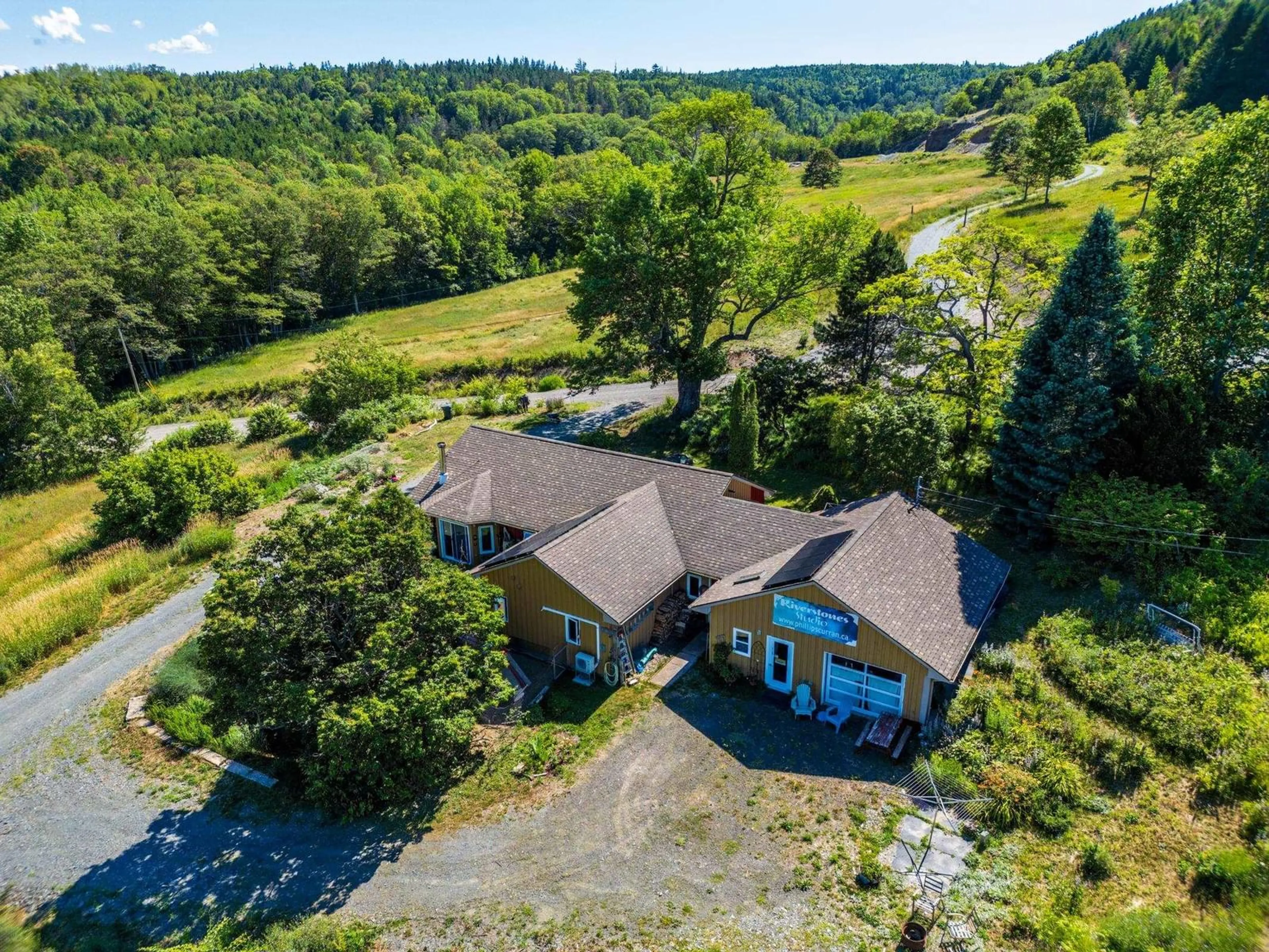 A pic from outside/outdoor area/front of a property/back of a property/a pic from drone, unknown for 541 Riverview Road, Bear River Nova Scotia B0S 1B0