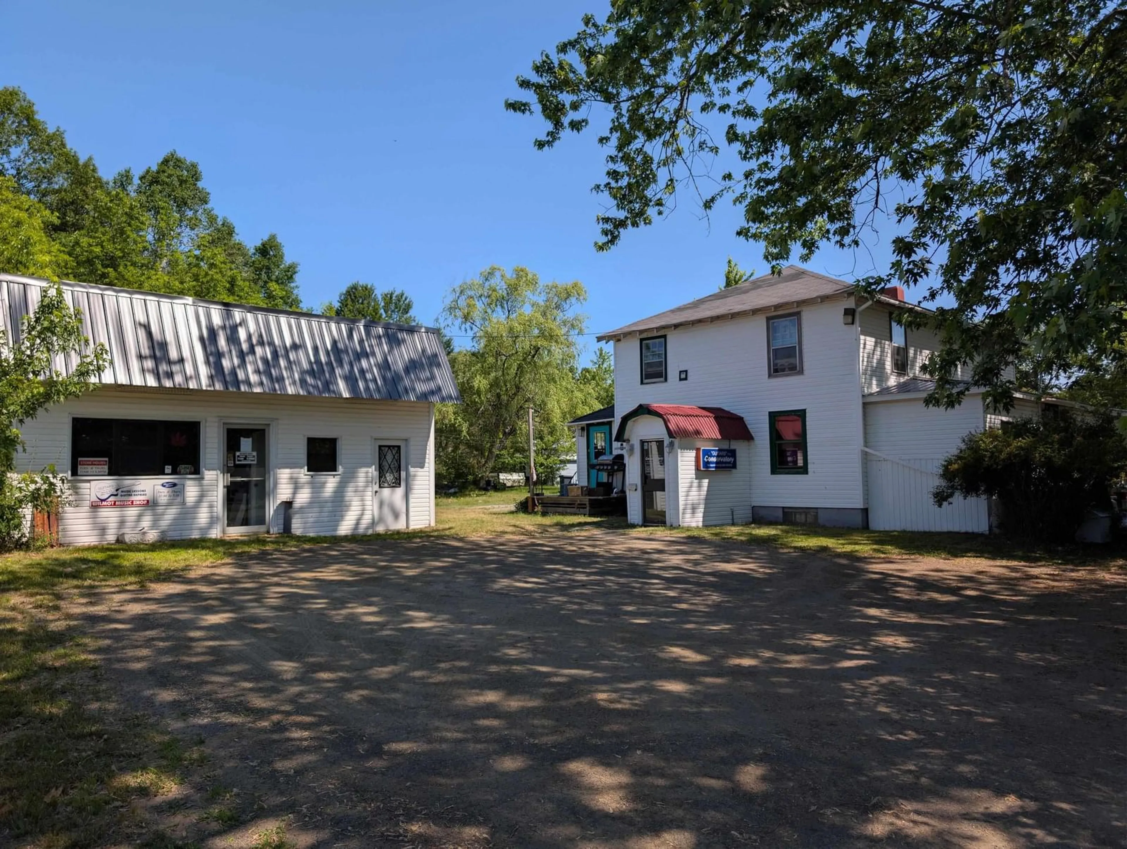 A pic from outside/outdoor area/front of a property/back of a property/a pic from drone, building for 14525 Highway 1, Wilmot Nova Scotia B0P 1W0