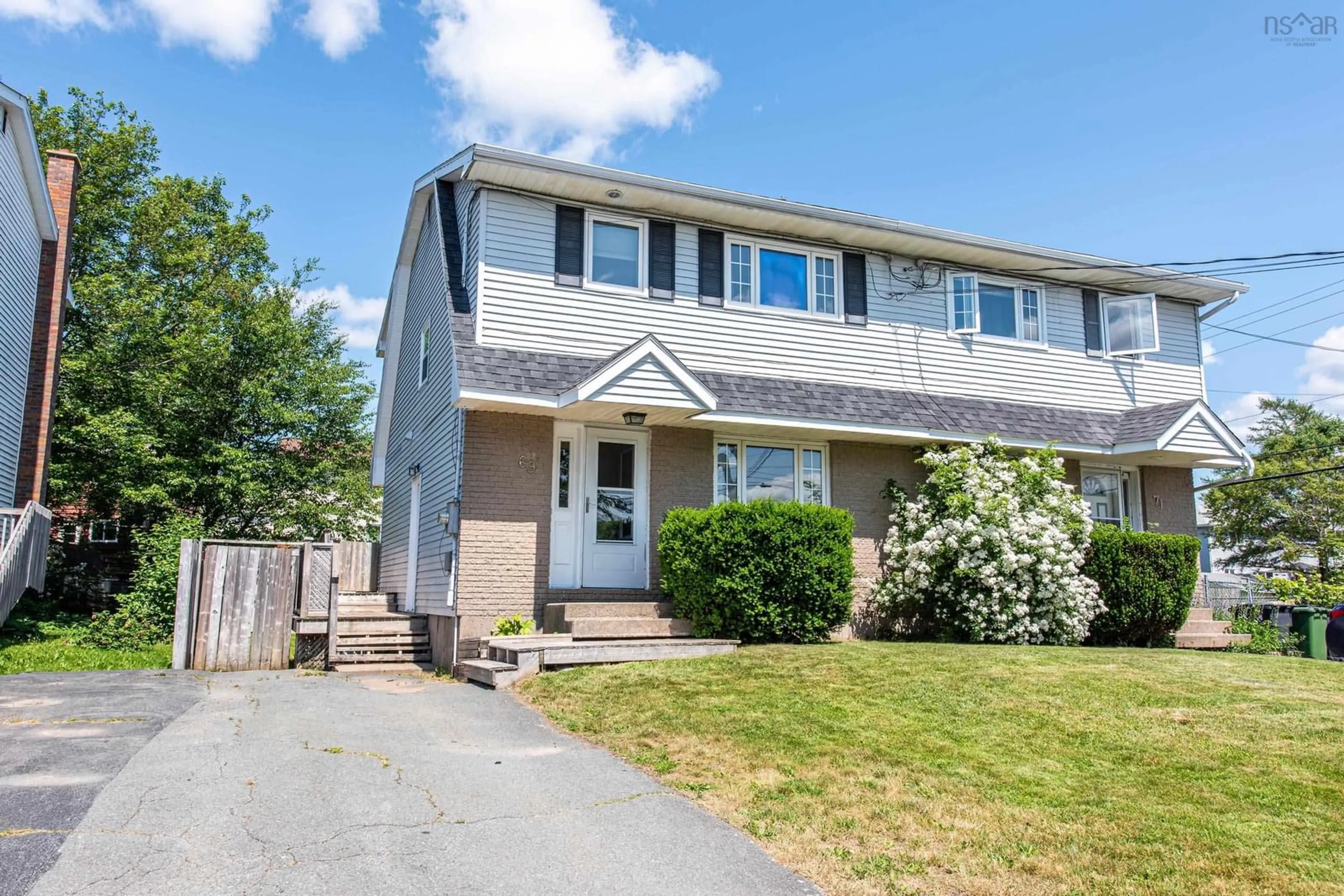 Home with vinyl exterior material, street for 69 Montebello Dr, Dartmouth Nova Scotia B2X 3L1