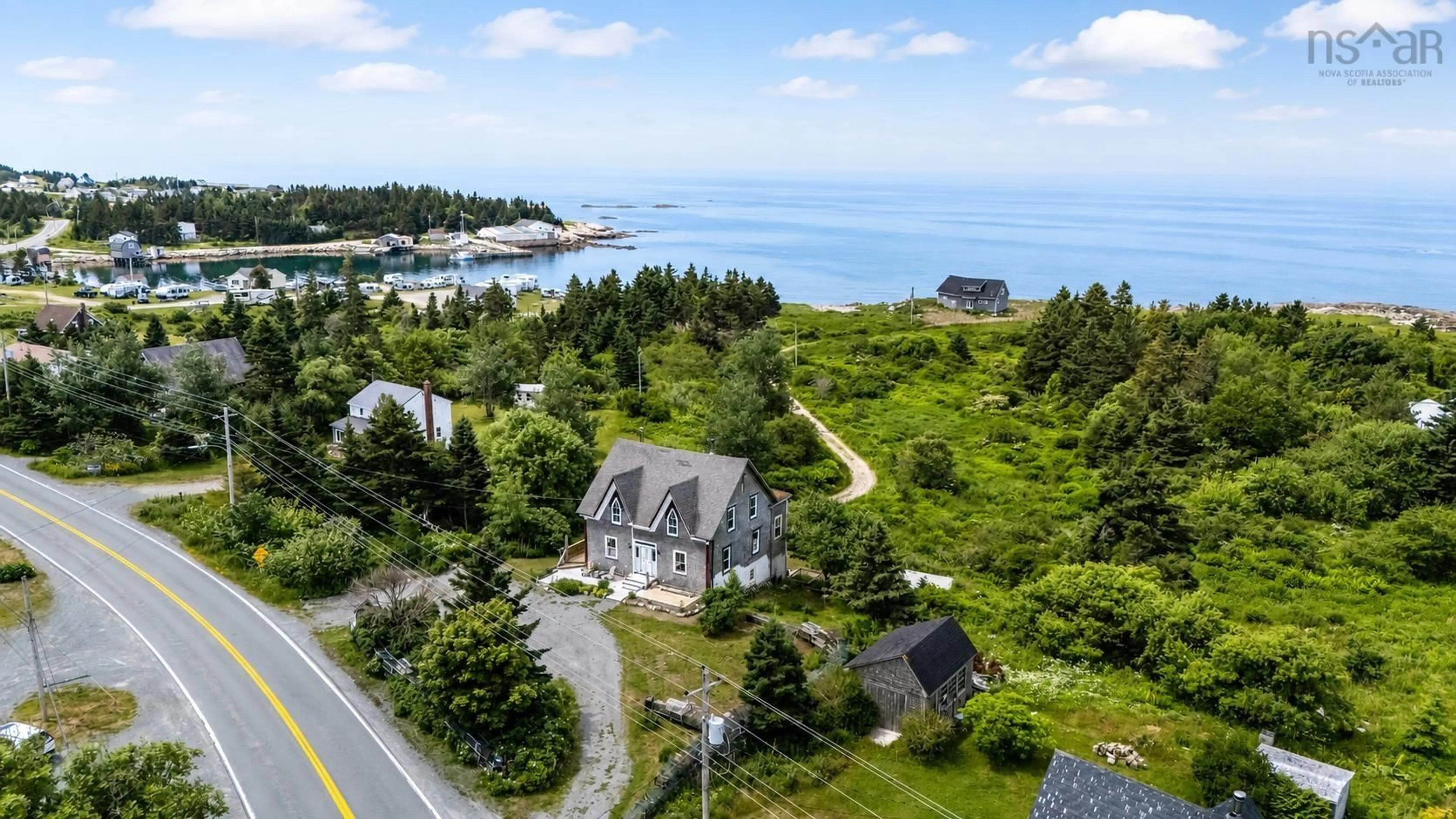 A pic from outside/outdoor area/front of a property/back of a property/a pic from drone, water/lake/river/ocean view for 8580 Peggys Cove, Indian Harbour Nova Scotia B3Z 3P4