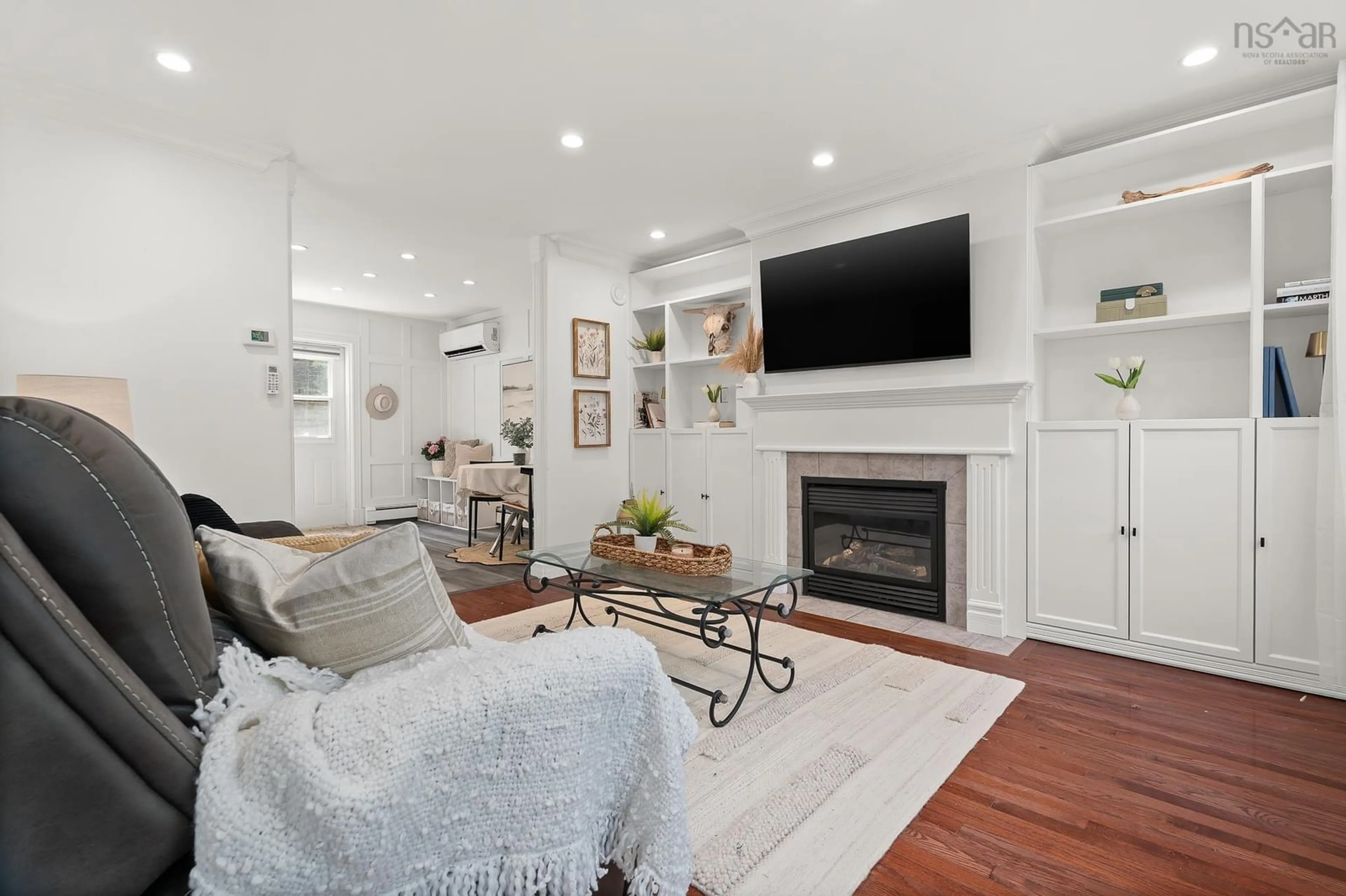 Living room with furniture, wood/laminate floor for 579 Waterstone Run, Hammonds Plains Nova Scotia B4B 1X6