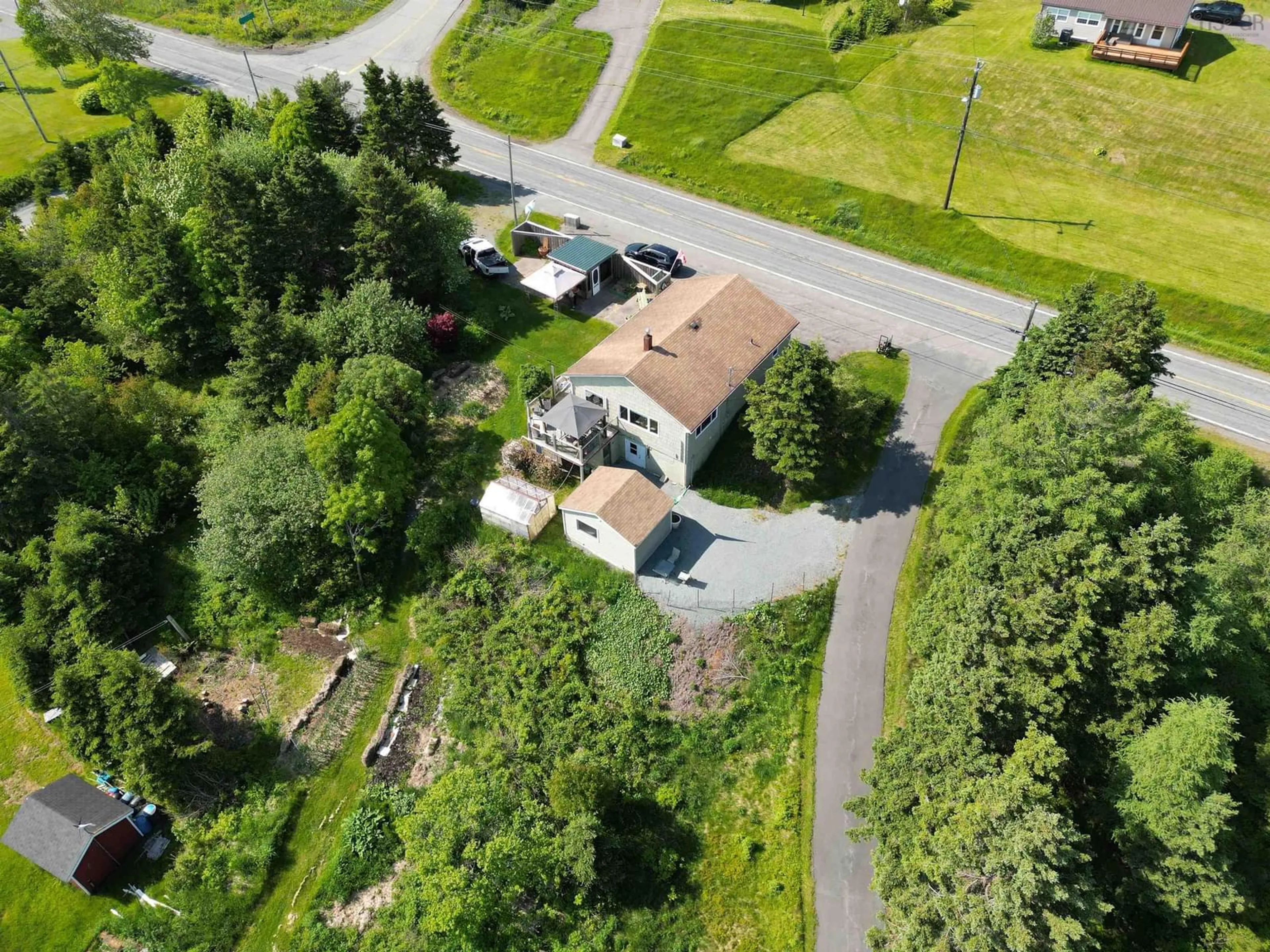 A pic from outside/outdoor area/front of a property/back of a property/a pic from drone, street for 8316 4 Hwy, River Bourgeois Nova Scotia B0E 2X0