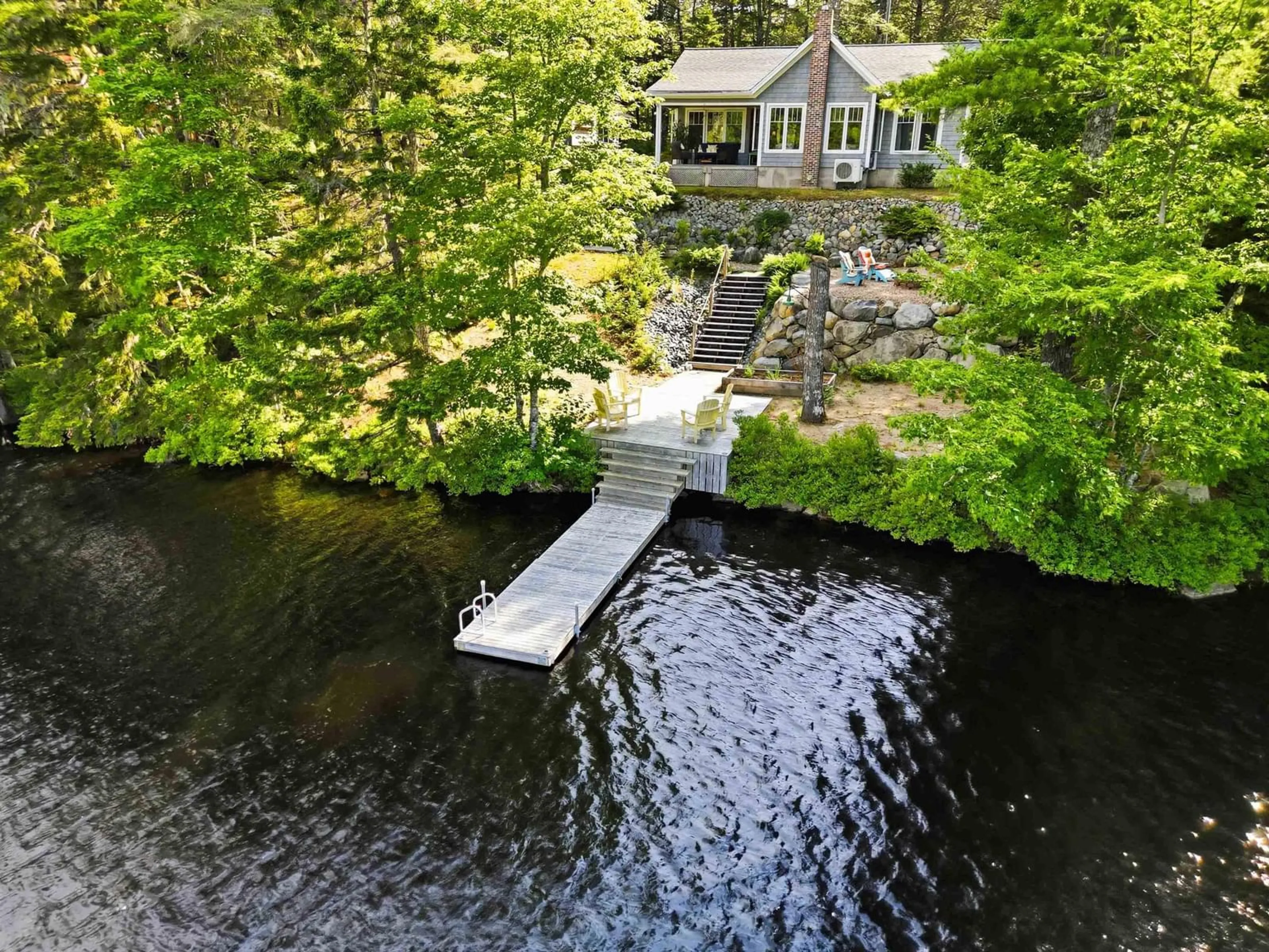 A pic from outside/outdoor area/front of a property/back of a property/a pic from drone, water/lake/river/ocean view for 110 Hidden Lake West, Labelle Nova Scotia B0T 1E0