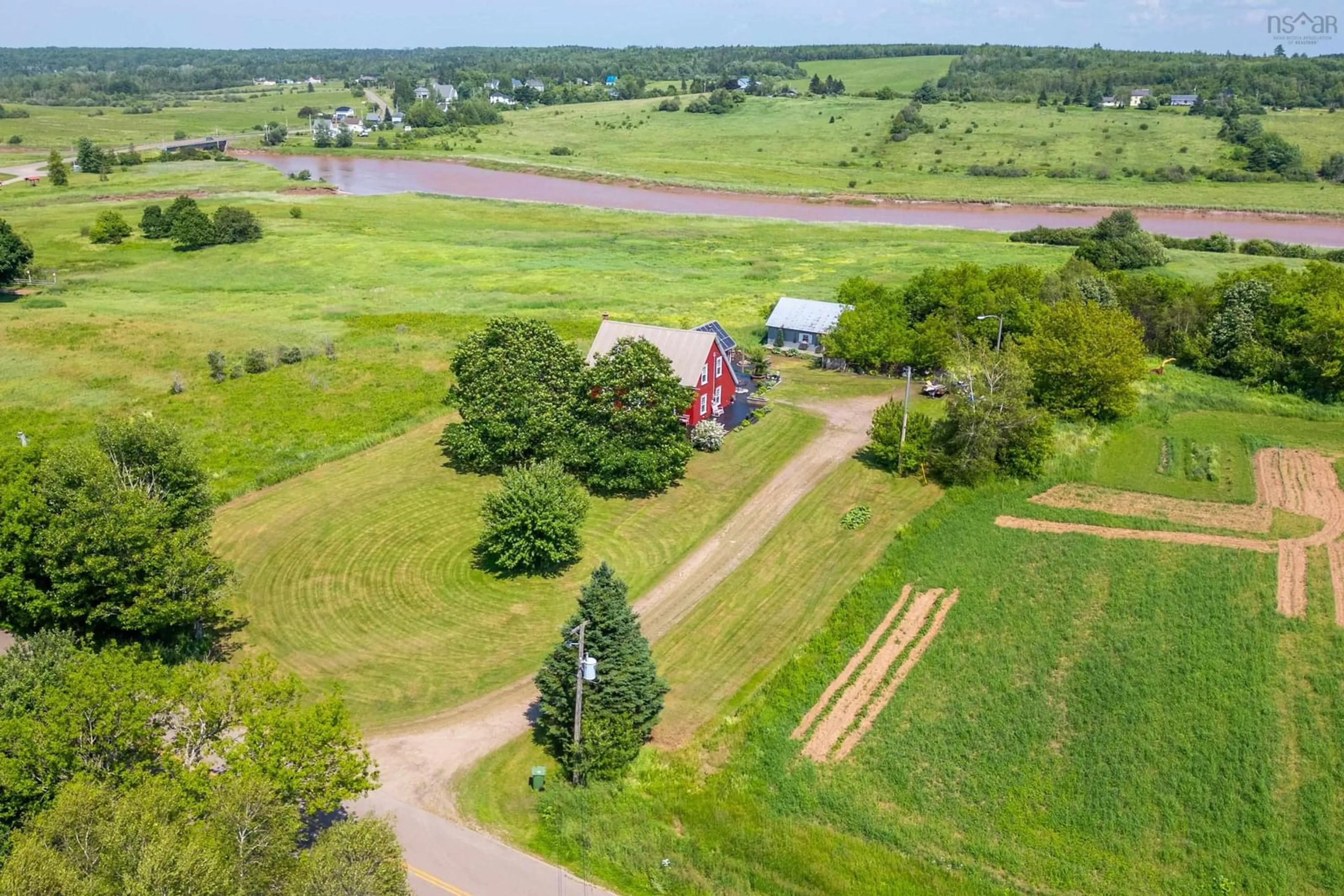 A pic from outside/outdoor area/front of a property/back of a property/a pic from drone, water/lake/river/ocean view for 2600 Barronsfield Road, River Hebert Nova Scotia B0L 1G0