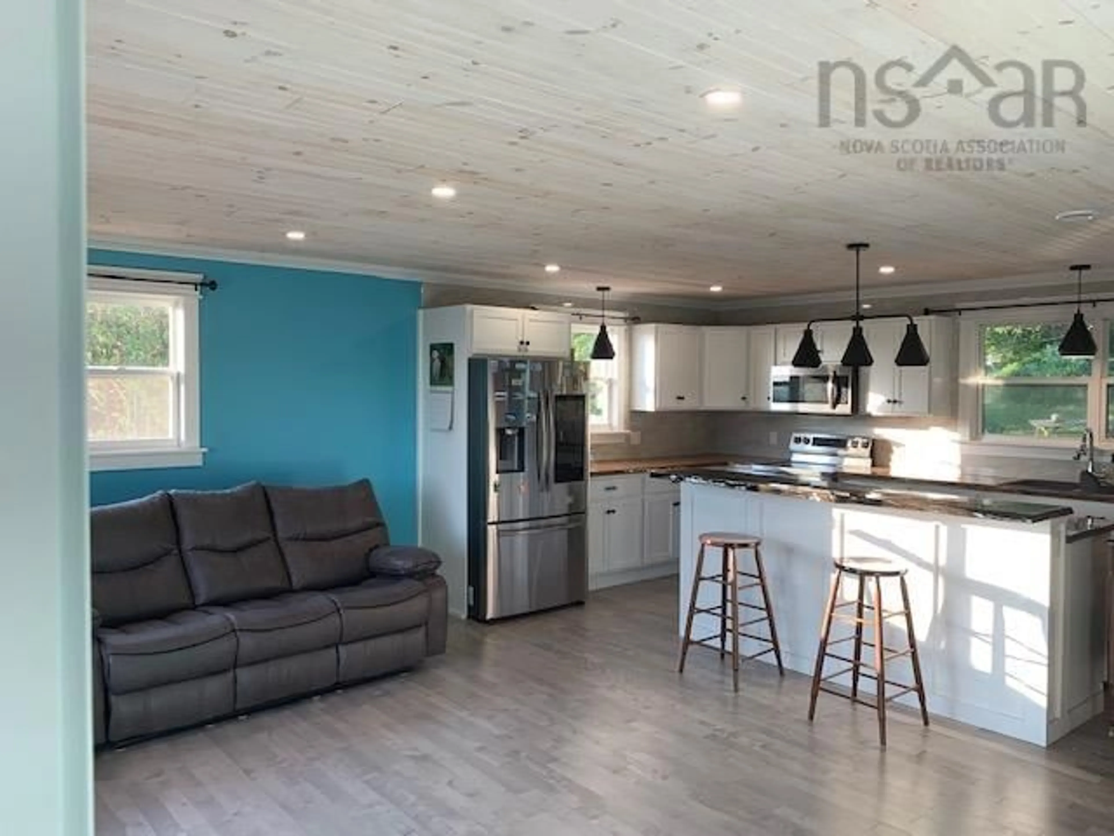 Open concept kitchen, wood/laminate floor for 6&6A Brightman Ave, Currys Corner Nova Scotia B0N 2T0