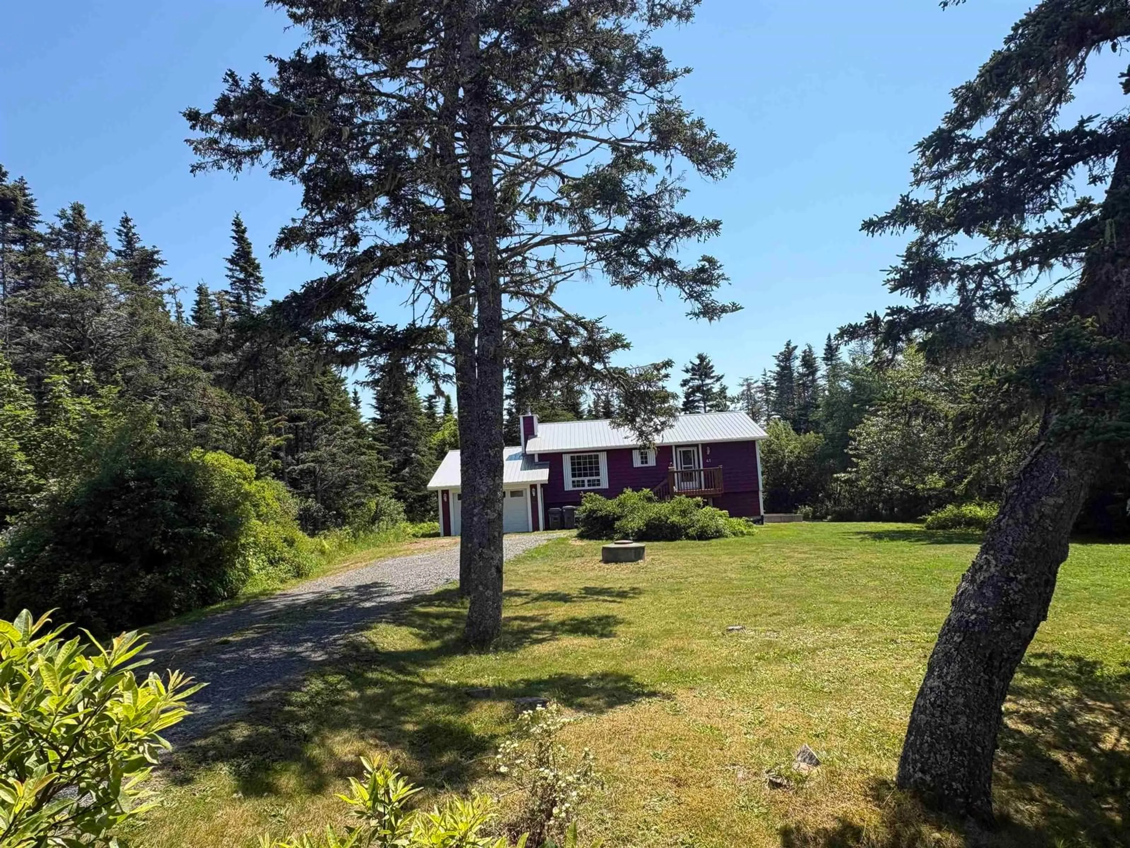 A pic from outside/outdoor area/front of a property/back of a property/a pic from drone, forest/trees view for 41 Abbotts Harbour, Middle West Pubnico Nova Scotia B0W 2S0