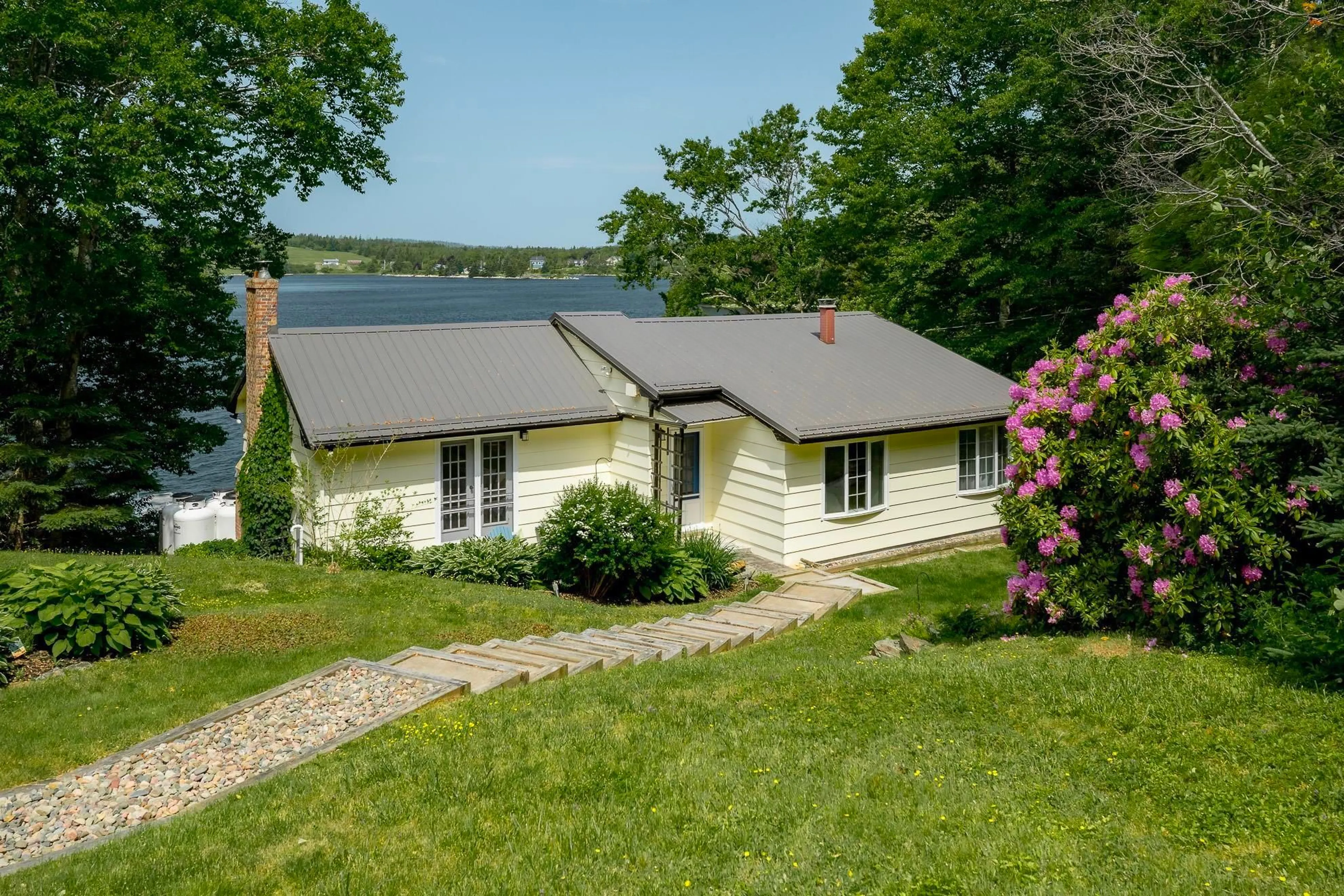 A pic from outside/outdoor area/front of a property/back of a property/a pic from drone, water/lake/river/ocean view for 340 East Petpeswick Rd, Musquodoboit Harbour Nova Scotia B0J 2L0