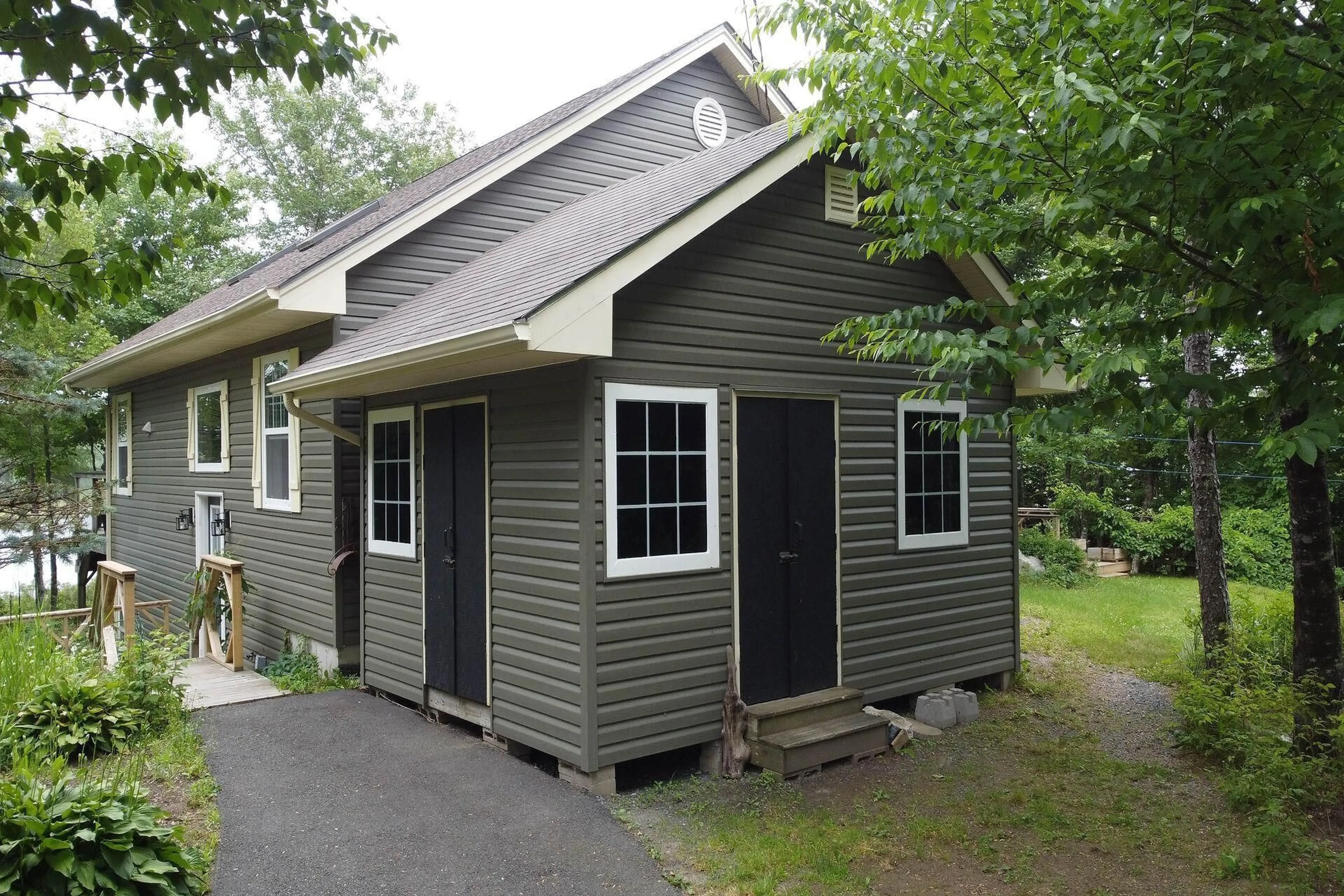 Home with vinyl exterior material, street for 51 Back Lake, Hatchet Lake Nova Scotia B3T 1R5