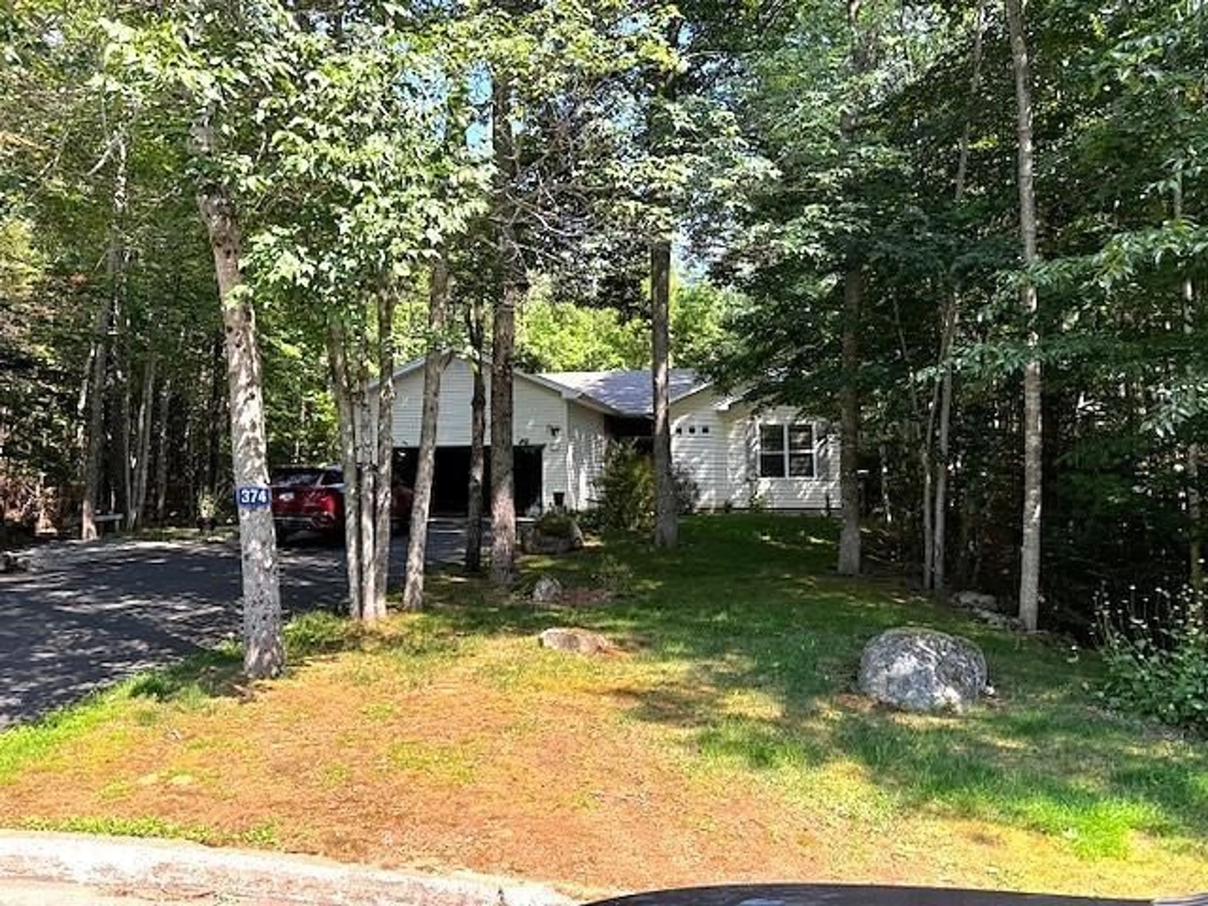 A pic from outside/outdoor area/front of a property/back of a property/a pic from drone, forest/trees view for 374 Brady St, Bridgewater Nova Scotia B4V 3W4
