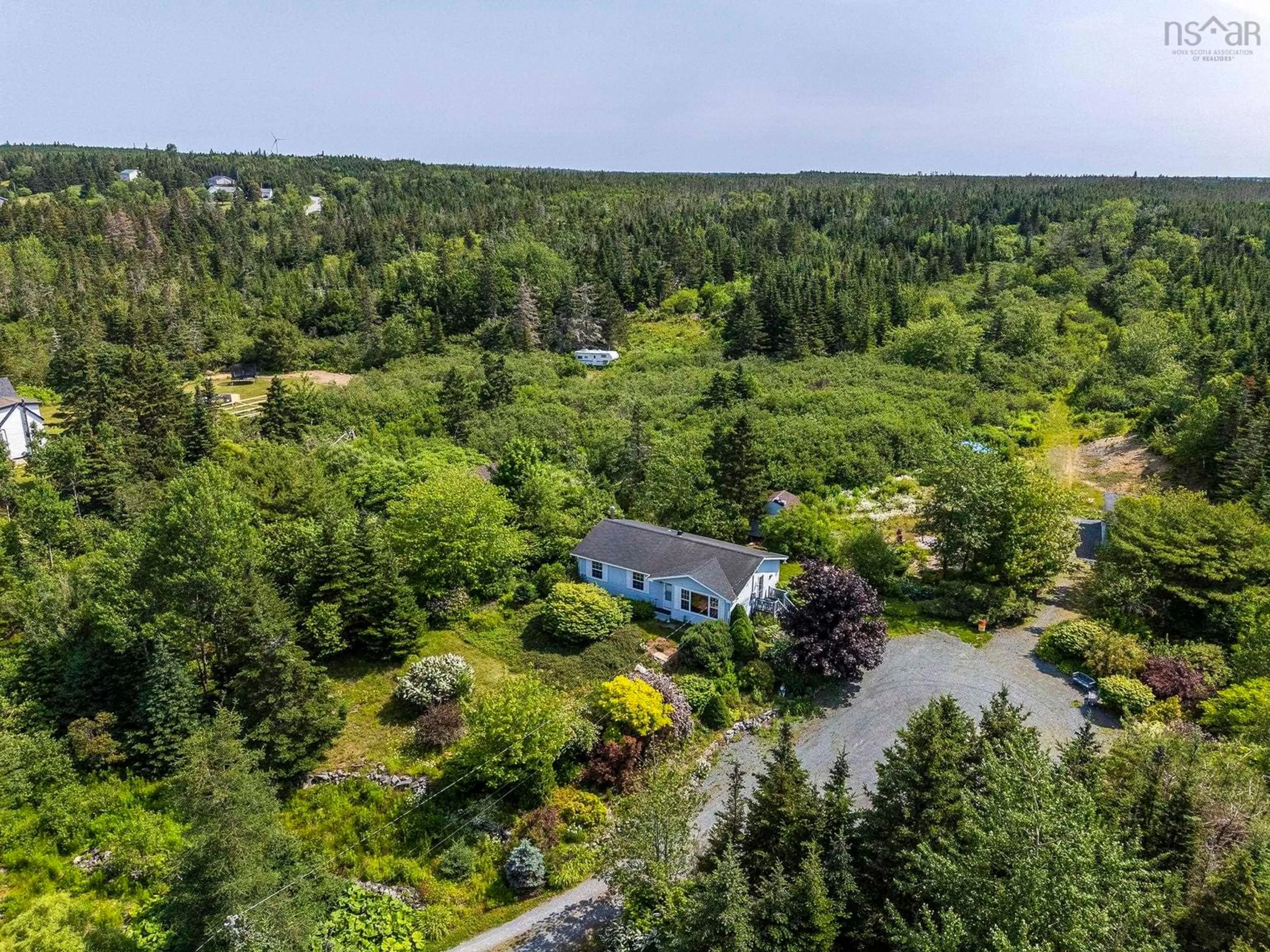 A pic from outside/outdoor area/front of a property/back of a property/a pic from drone, water/lake/river/ocean view for 875 East Chezzetcook Road, Chezzetcook Nova Scotia B0J 2L0