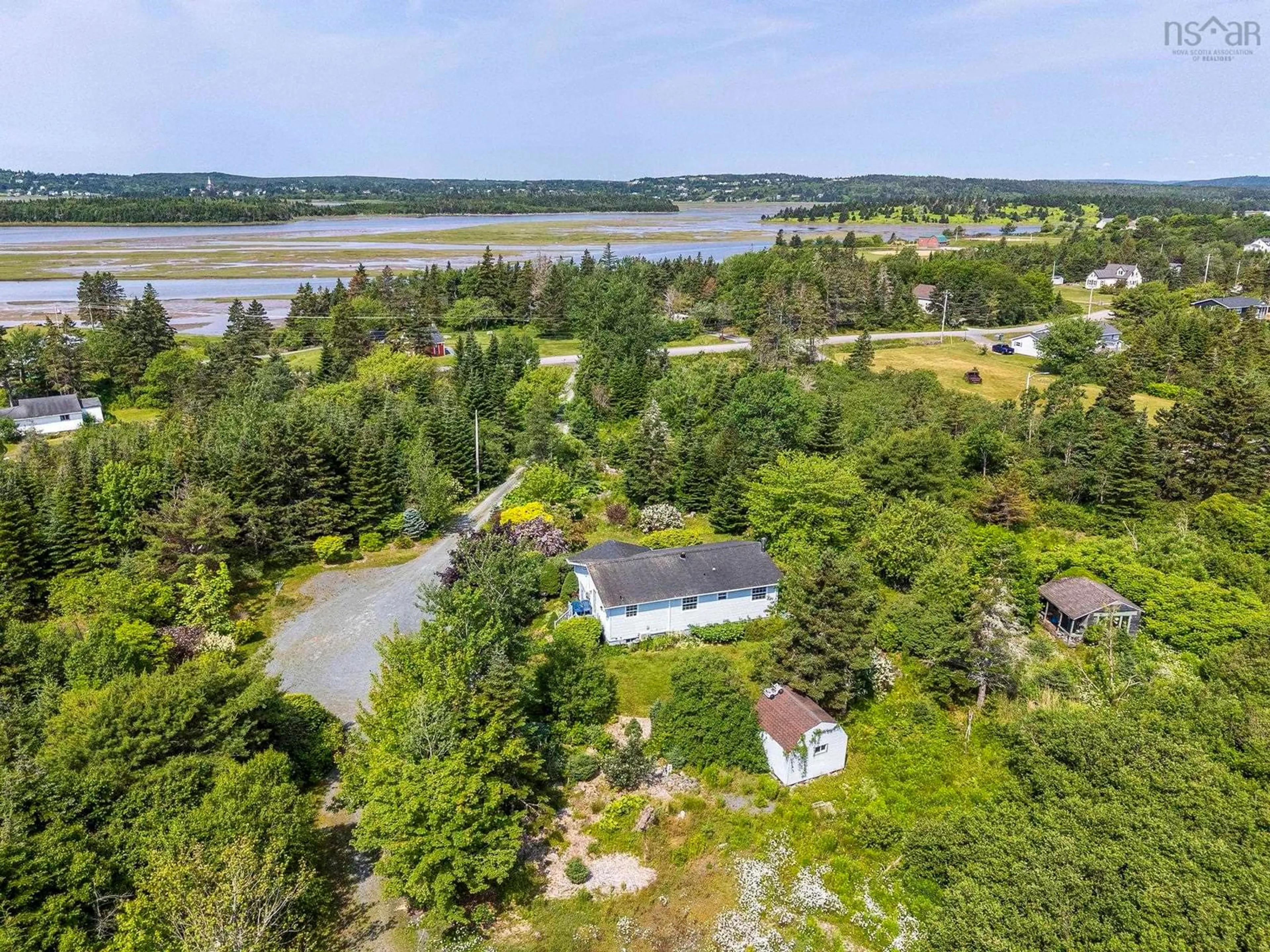 A pic from outside/outdoor area/front of a property/back of a property/a pic from drone, water/lake/river/ocean view for 875 East Chezzetcook Road, Chezzetcook Nova Scotia B0J 2L0