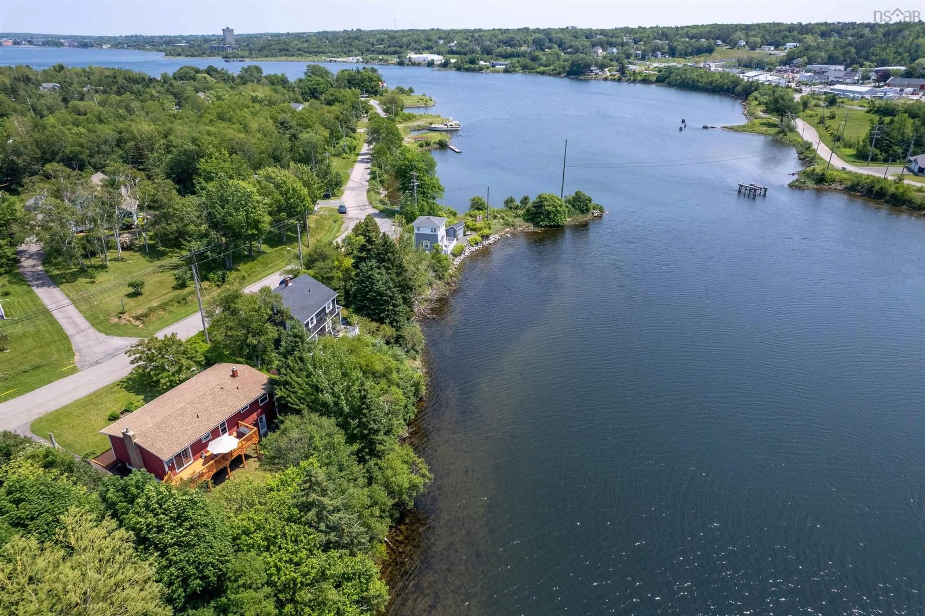 A pic from outside/outdoor area/front of a property/back of a property/a pic from drone, water/lake/river/ocean view for 20 Sunrise Dr, Westmount Nova Scotia B1R 1N7