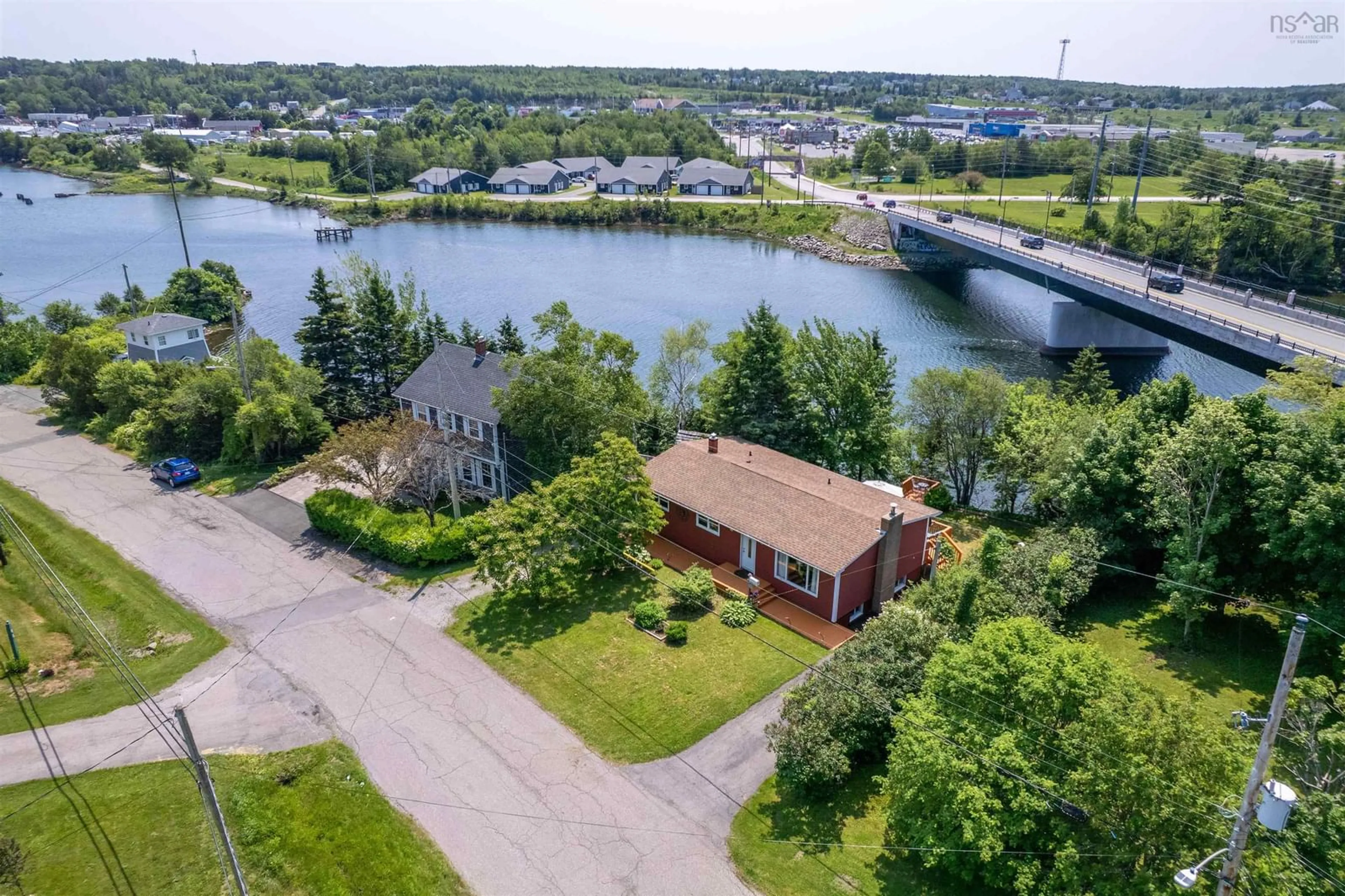 A pic from outside/outdoor area/front of a property/back of a property/a pic from drone, water/lake/river/ocean view for 20 Sunrise Dr, Westmount Nova Scotia B1R 1N7