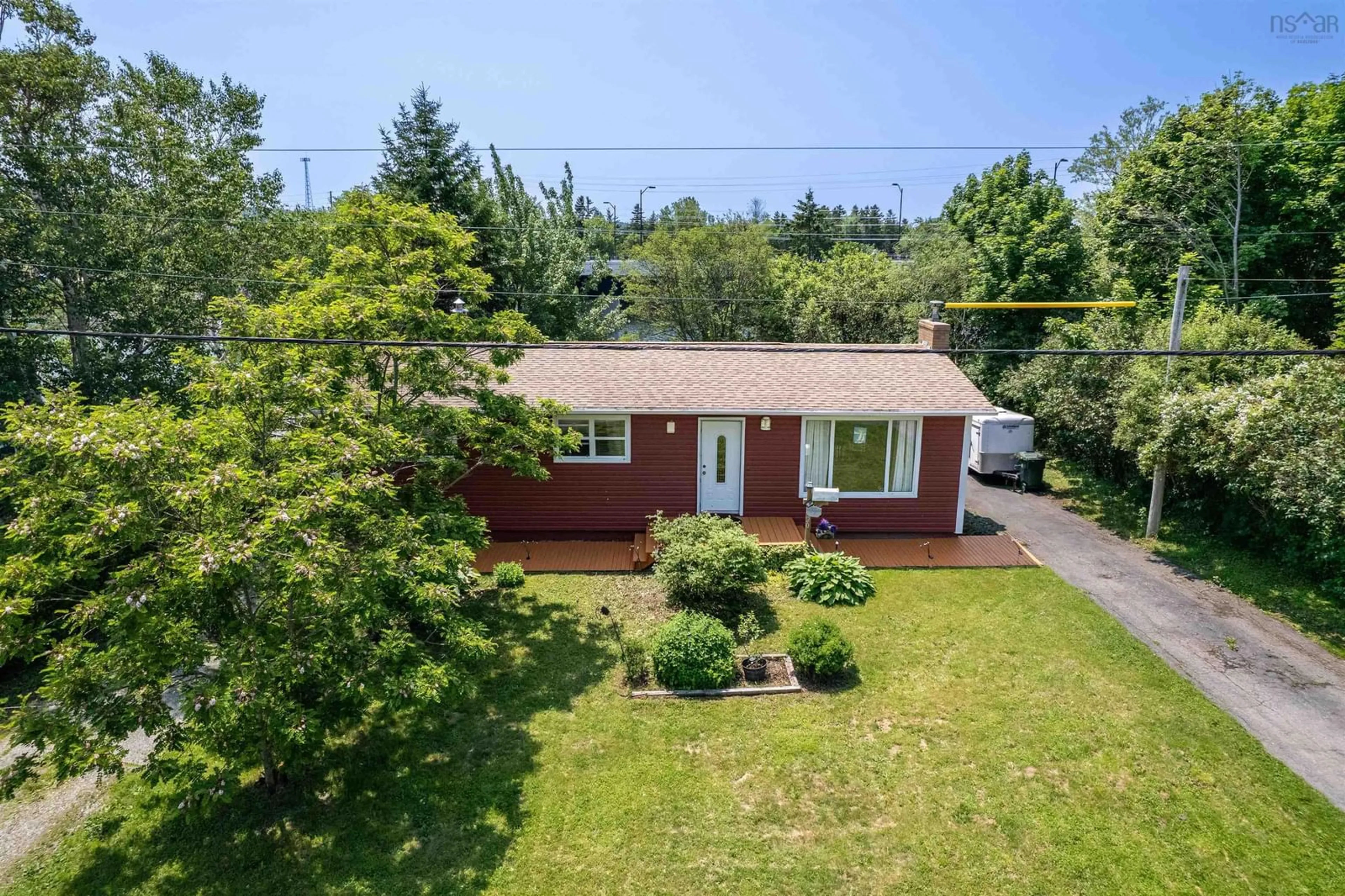 A pic from outside/outdoor area/front of a property/back of a property/a pic from drone, street for 20 Sunrise Dr, Westmount Nova Scotia B1R 1N7