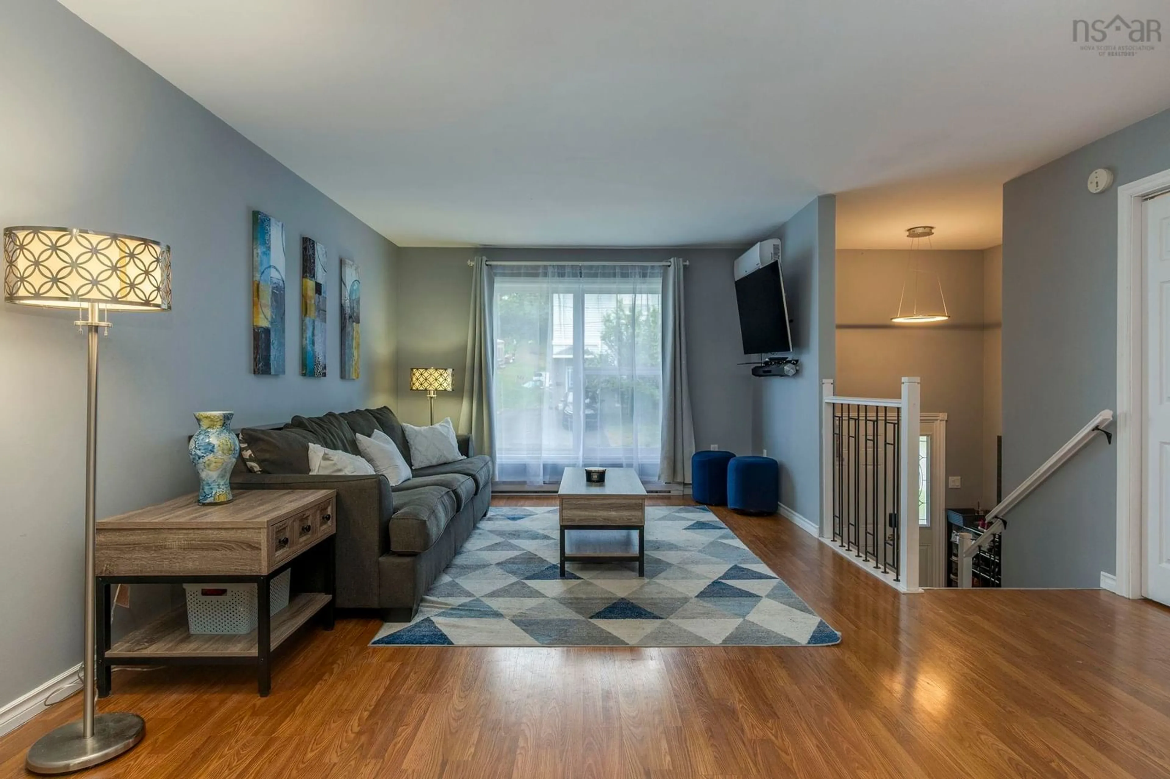 Living room with furniture, wood/laminate floor for 27 Florence Place Crt, Lower Sackville Nova Scotia B4L 3X3