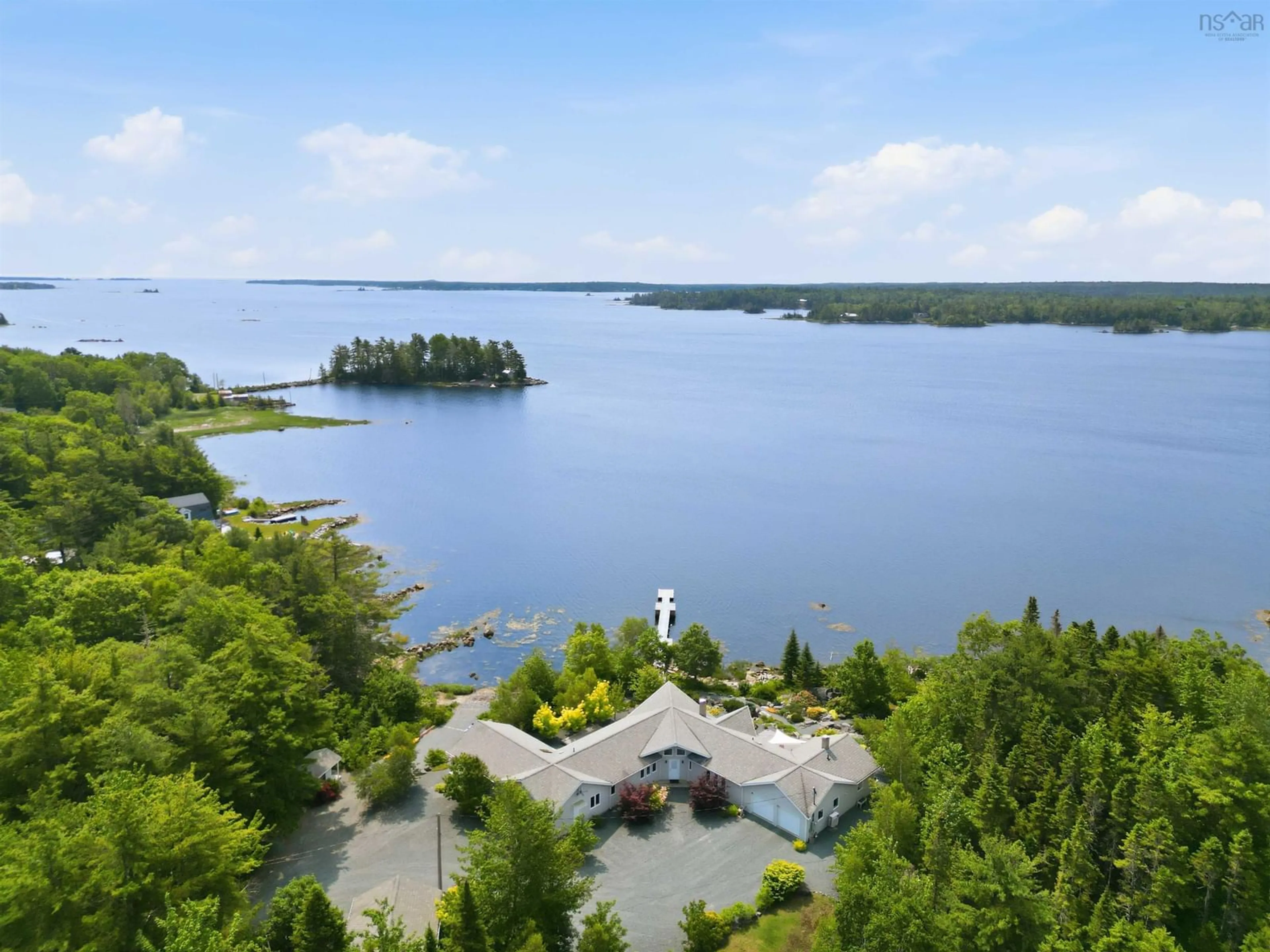 A pic from outside/outdoor area/front of a property/back of a property/a pic from drone, water/lake/river/ocean view for 668 Highway 331, East Port Medway Nova Scotia B0J 2H0