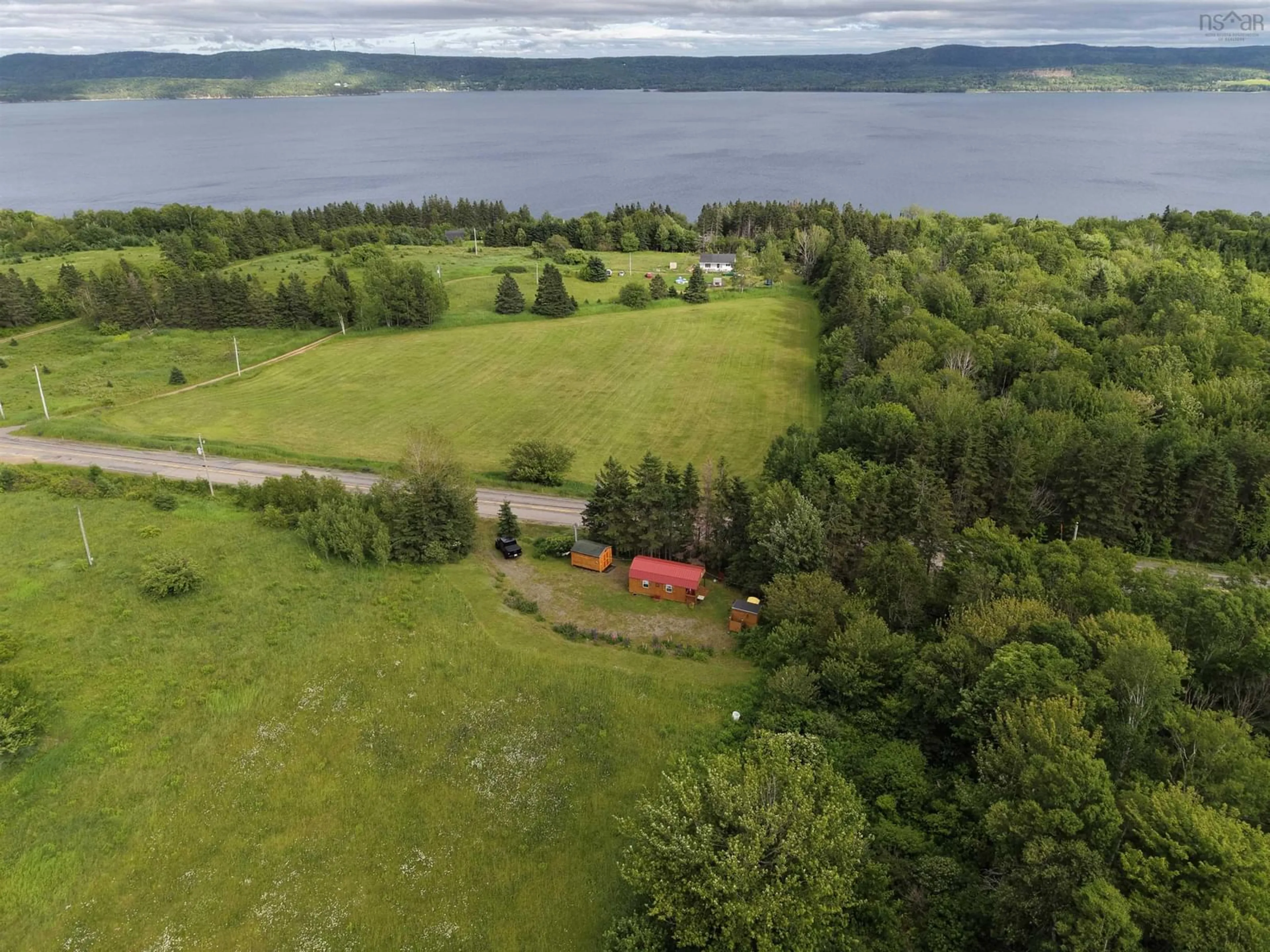 A pic from outside/outdoor area/front of a property/back of a property/a pic from drone, water/lake/river/ocean view for 3890 Hillside Boularderie Rd, Hillside Boularderie Nova Scotia B1Y 2R2