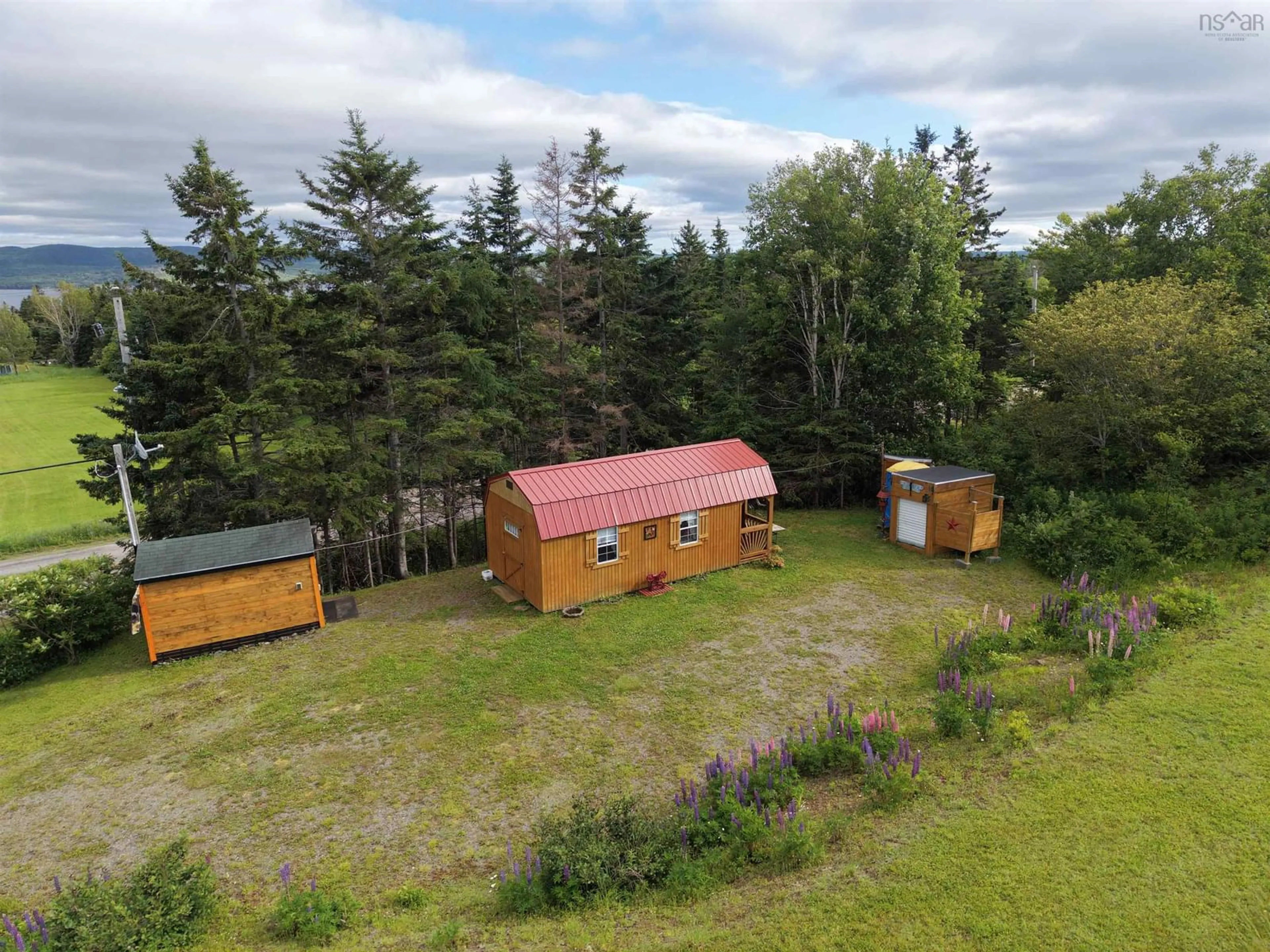 A pic from outside/outdoor area/front of a property/back of a property/a pic from drone, unknown for 3890 Hillside Boularderie Rd, Hillside Boularderie Nova Scotia B1Y 2R2