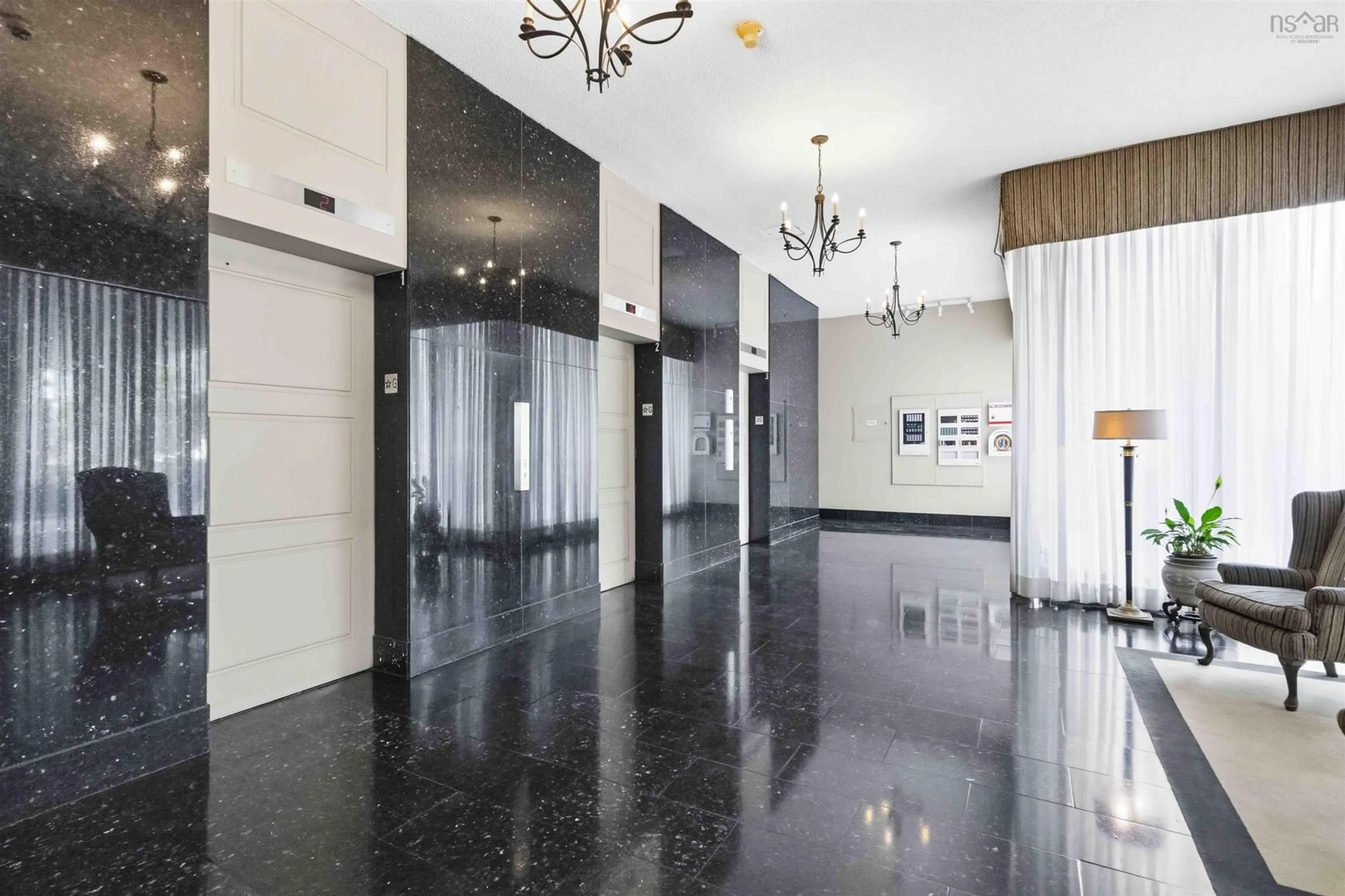 Indoor foyer for 5959 Spring Garden Rd #909, Halifax Nova Scotia B3H 1Y5