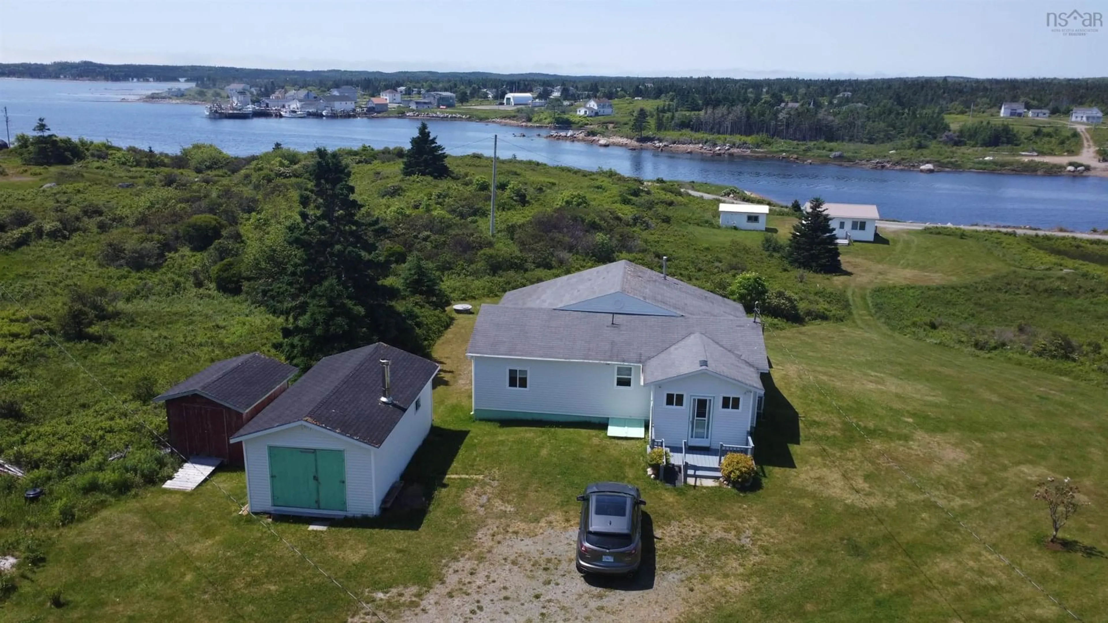 A pic from outside/outdoor area/front of a property/back of a property/a pic from drone, water/lake/river/ocean view for 130 Pellerin Road, Larry's River Nova Scotia B0H 1T0