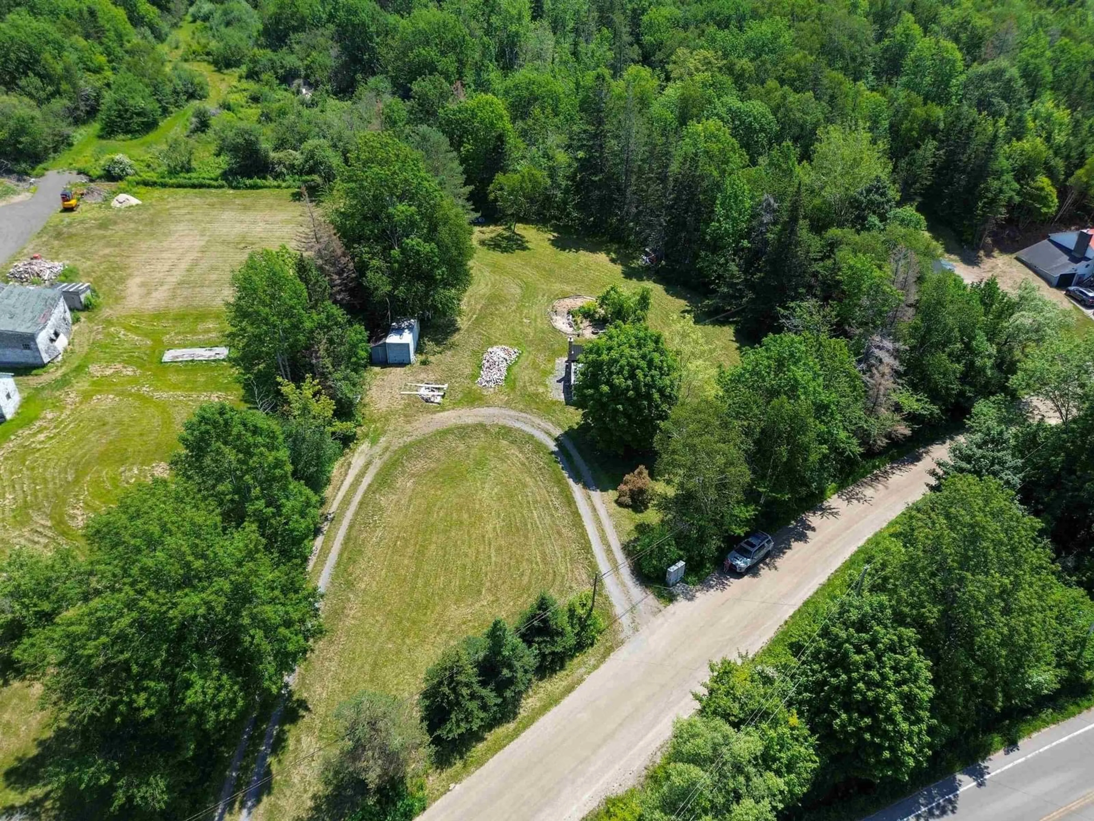 A pic from outside/outdoor area/front of a property/back of a property/a pic from drone, forest/trees view for 30 M And R Street, Clementsport Nova Scotia B0S 1A0