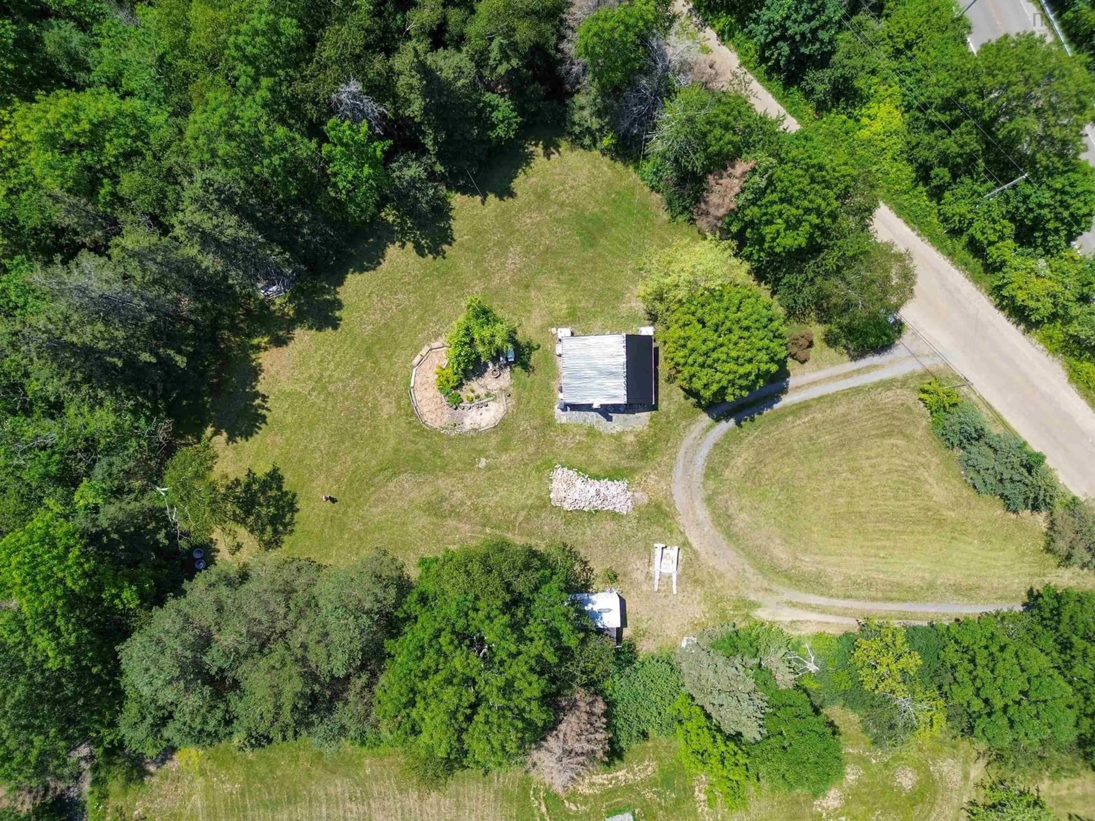 A pic from outside/outdoor area/front of a property/back of a property/a pic from drone, forest/trees view for 30 M And R Street, Clementsport Nova Scotia B0S 1A0