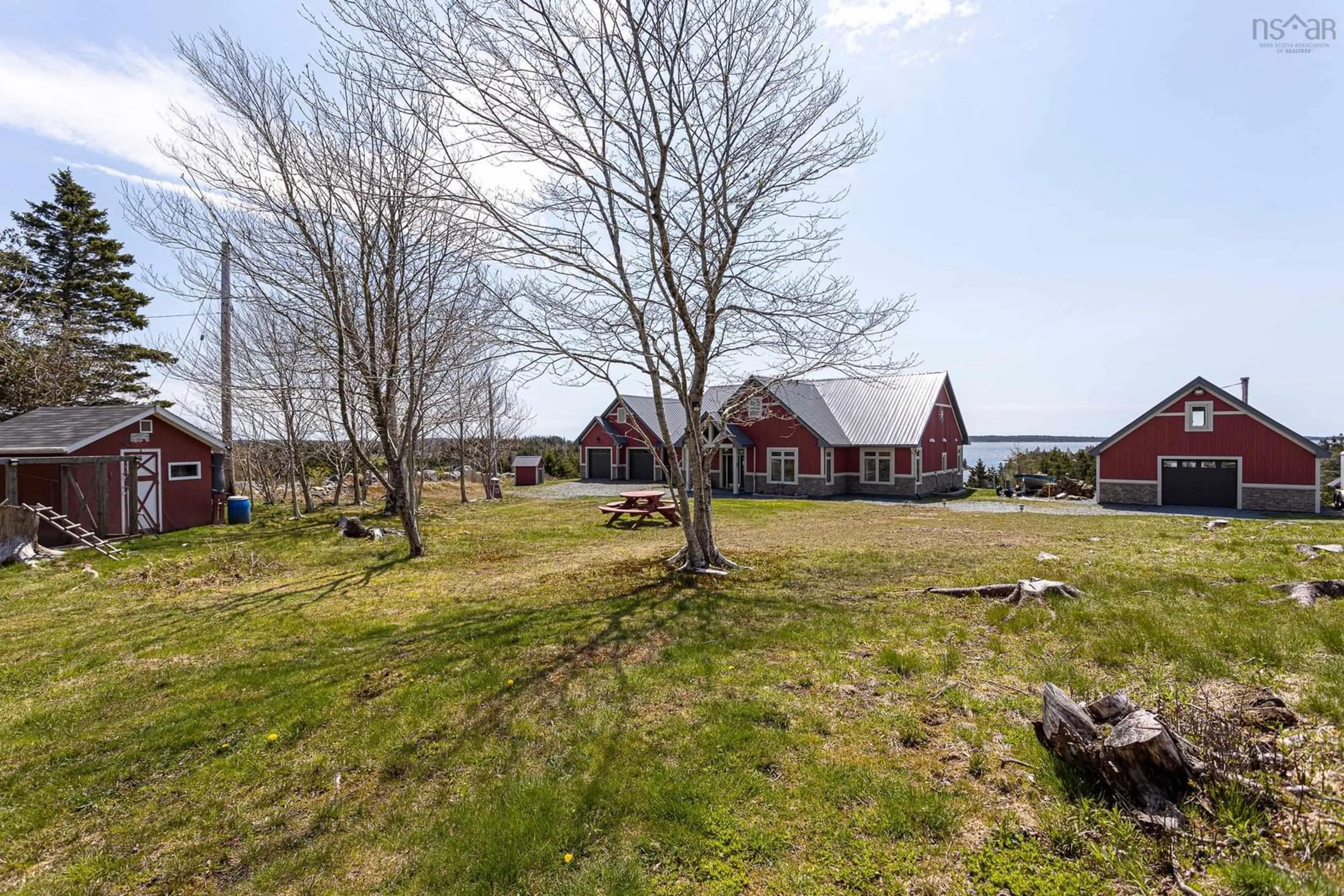 A pic from outside/outdoor area/front of a property/back of a property/a pic from drone, water/lake/river/ocean view for 65 Monks Rd, East Ship Harbour Nova Scotia B0J 3H0