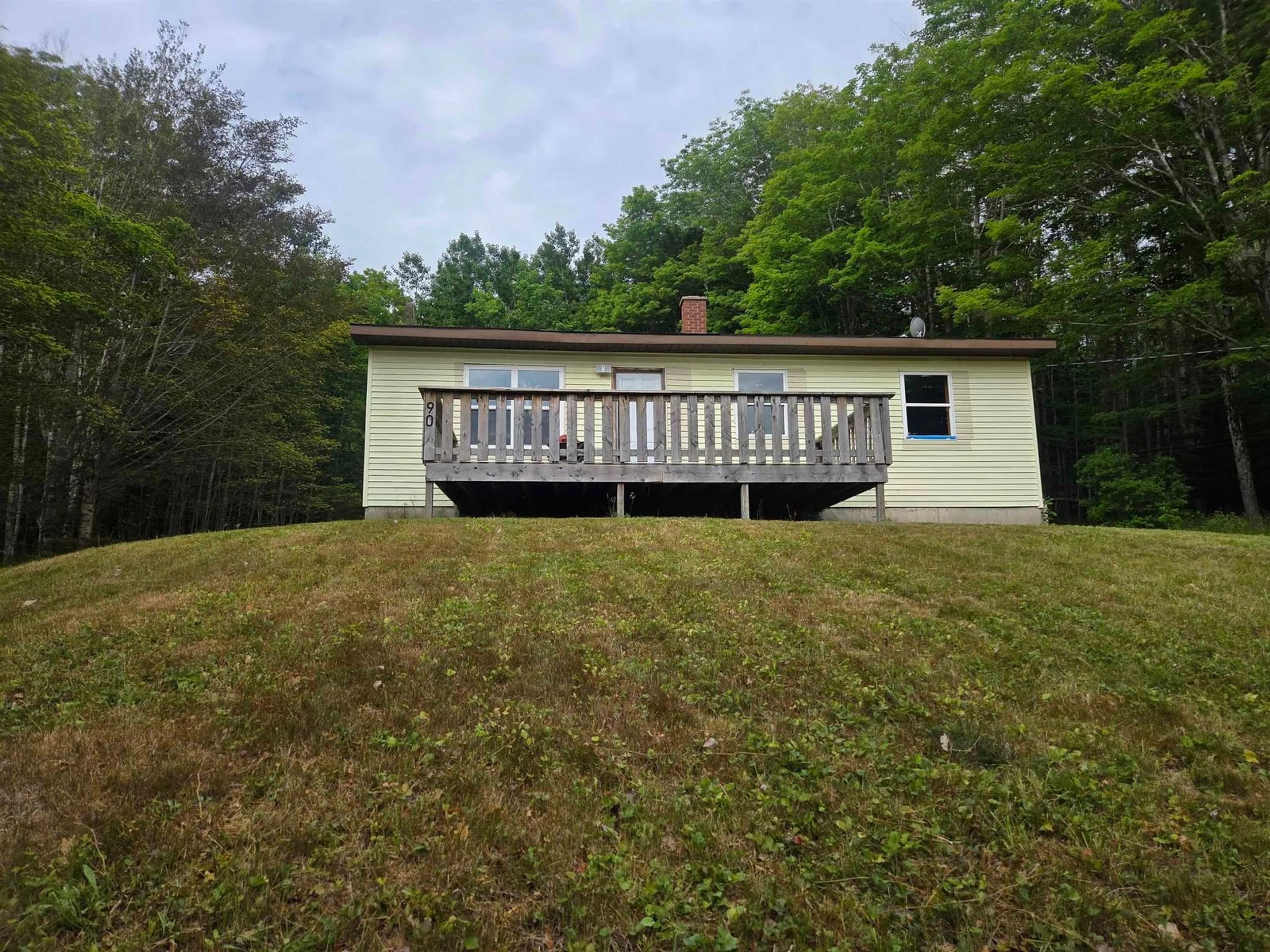 A pic from outside/outdoor area/front of a property/back of a property/a pic from drone, water/lake/river/ocean view for 90 Riverview Road, Bear River Nova Scotia B0S 1B0