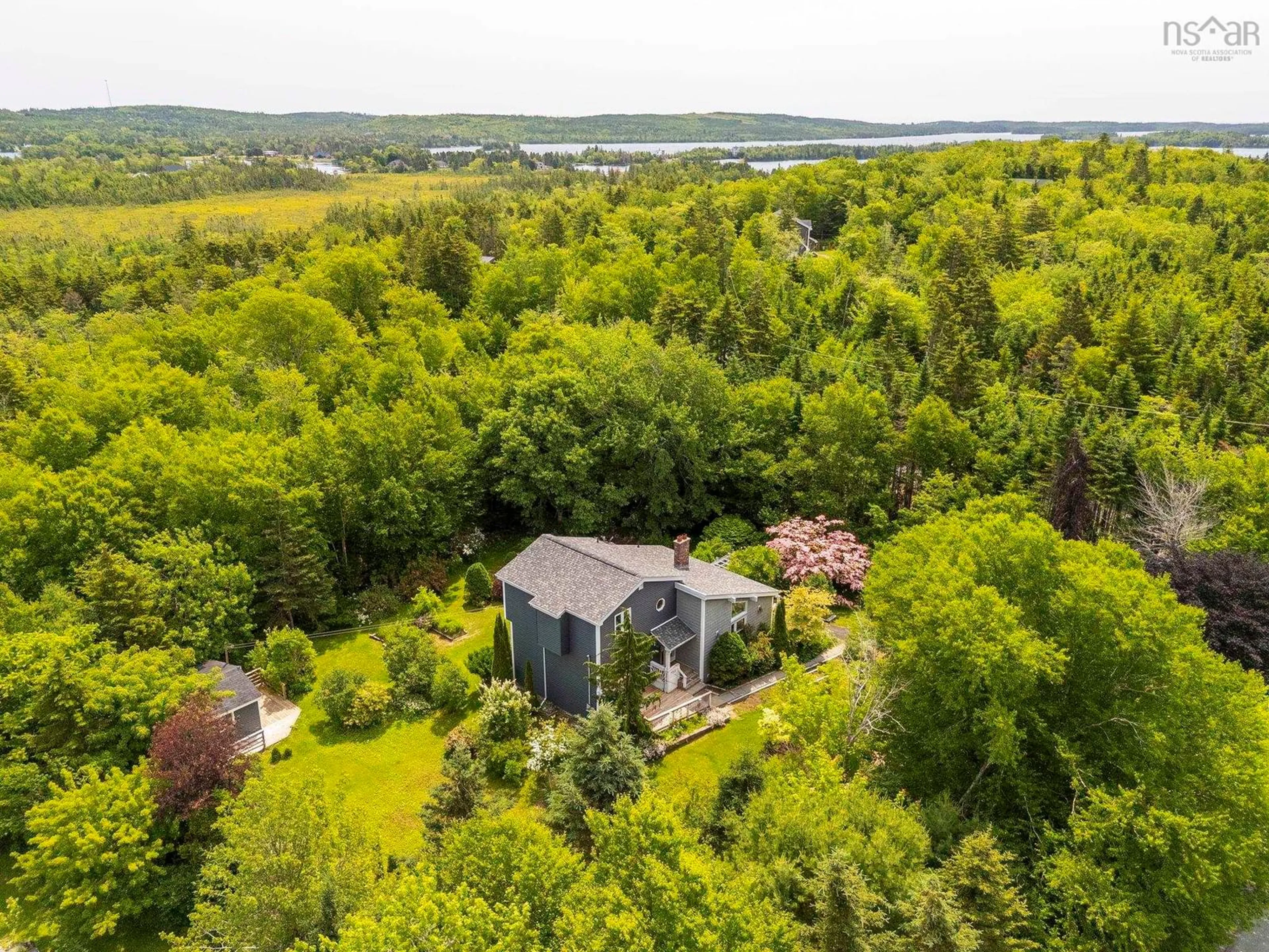A pic from outside/outdoor area/front of a property/back of a property/a pic from drone, water/lake/river/ocean view for 732 West Porters Lake Road, Porters Lake Nova Scotia B3E 1K6
