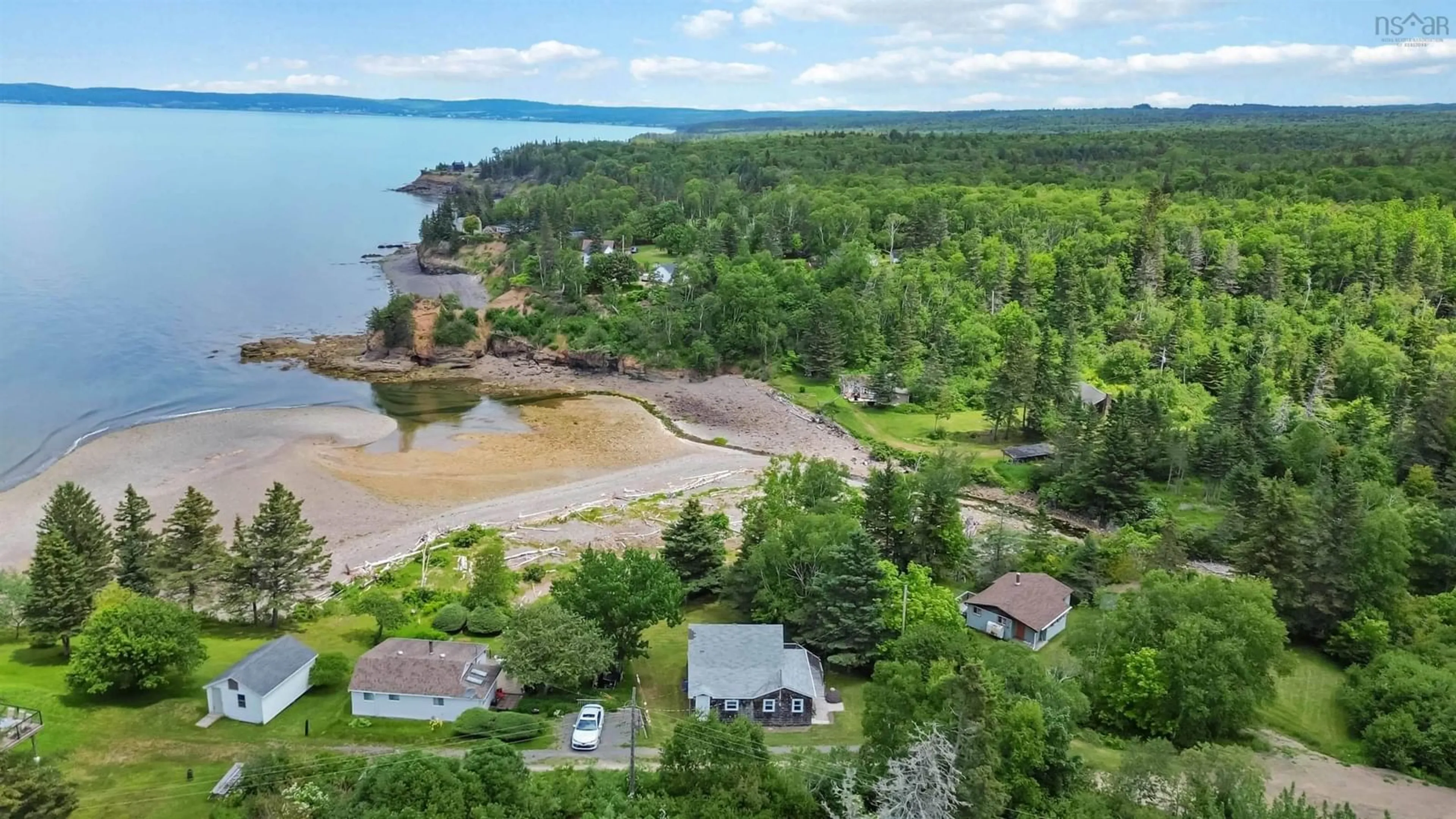 A pic from outside/outdoor area/front of a property/back of a property/a pic from drone, water/lake/river/ocean view for 1218 Bennetts Bay Rd, Bennett Bay Nova Scotia B0P 1H0