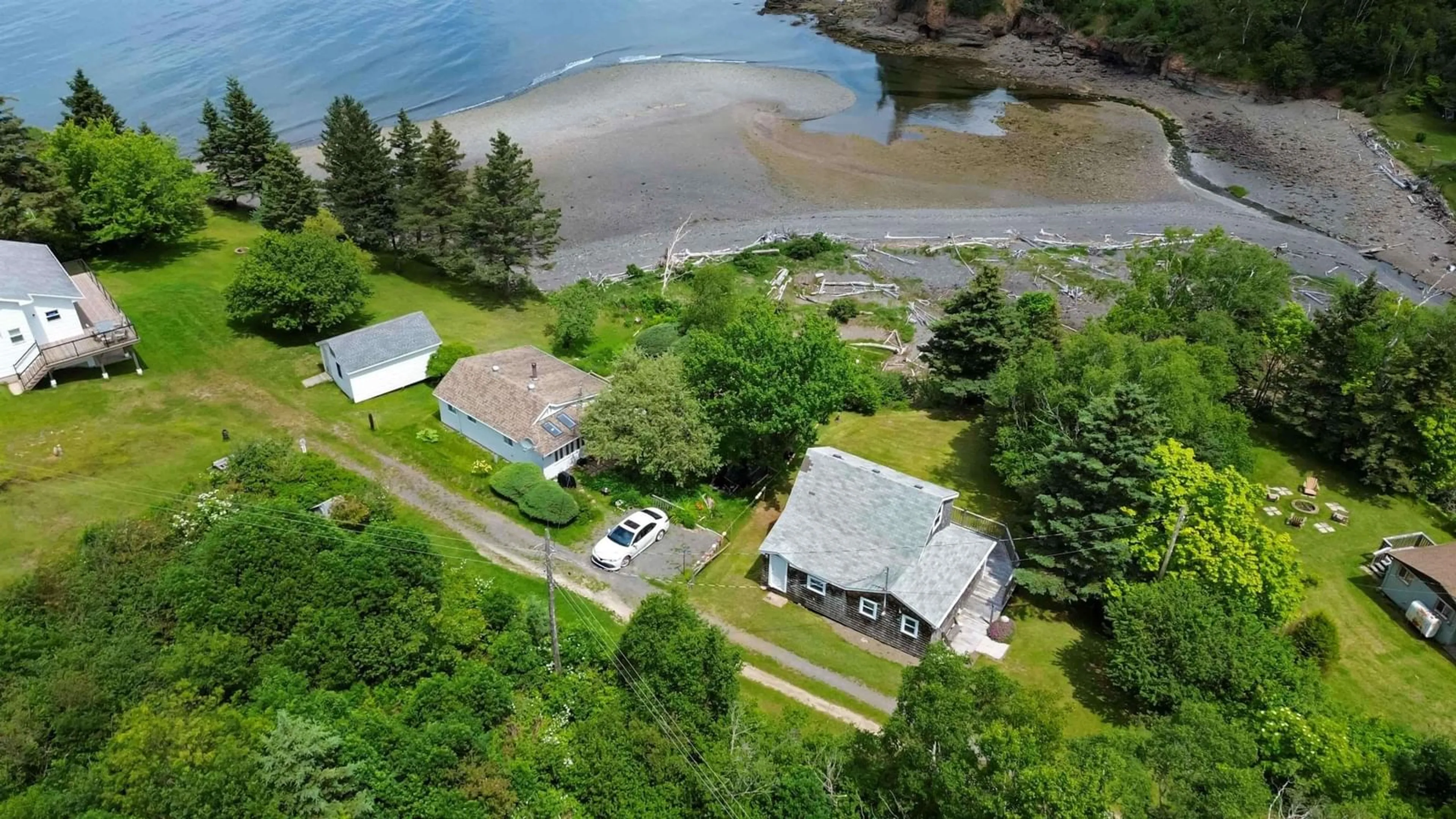 A pic from outside/outdoor area/front of a property/back of a property/a pic from drone, water/lake/river/ocean view for 1218 Bennetts Bay Rd, Bennett Bay Nova Scotia B0P 1H0