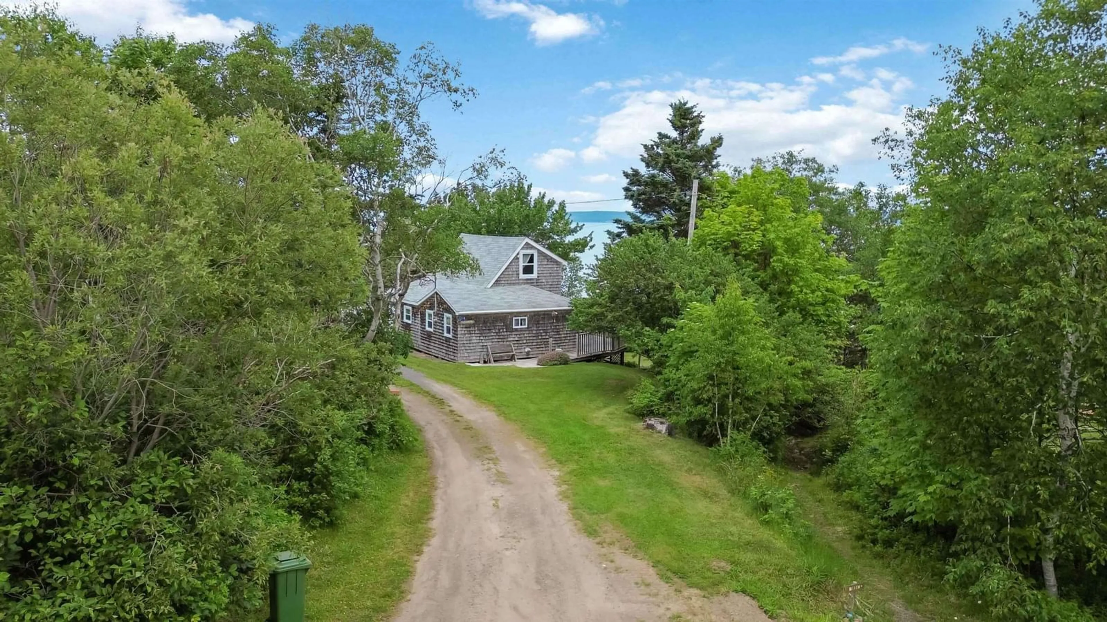 A pic from outside/outdoor area/front of a property/back of a property/a pic from drone, street for 1218 Bennetts Bay Rd, Bennett Bay Nova Scotia B0P 1H0