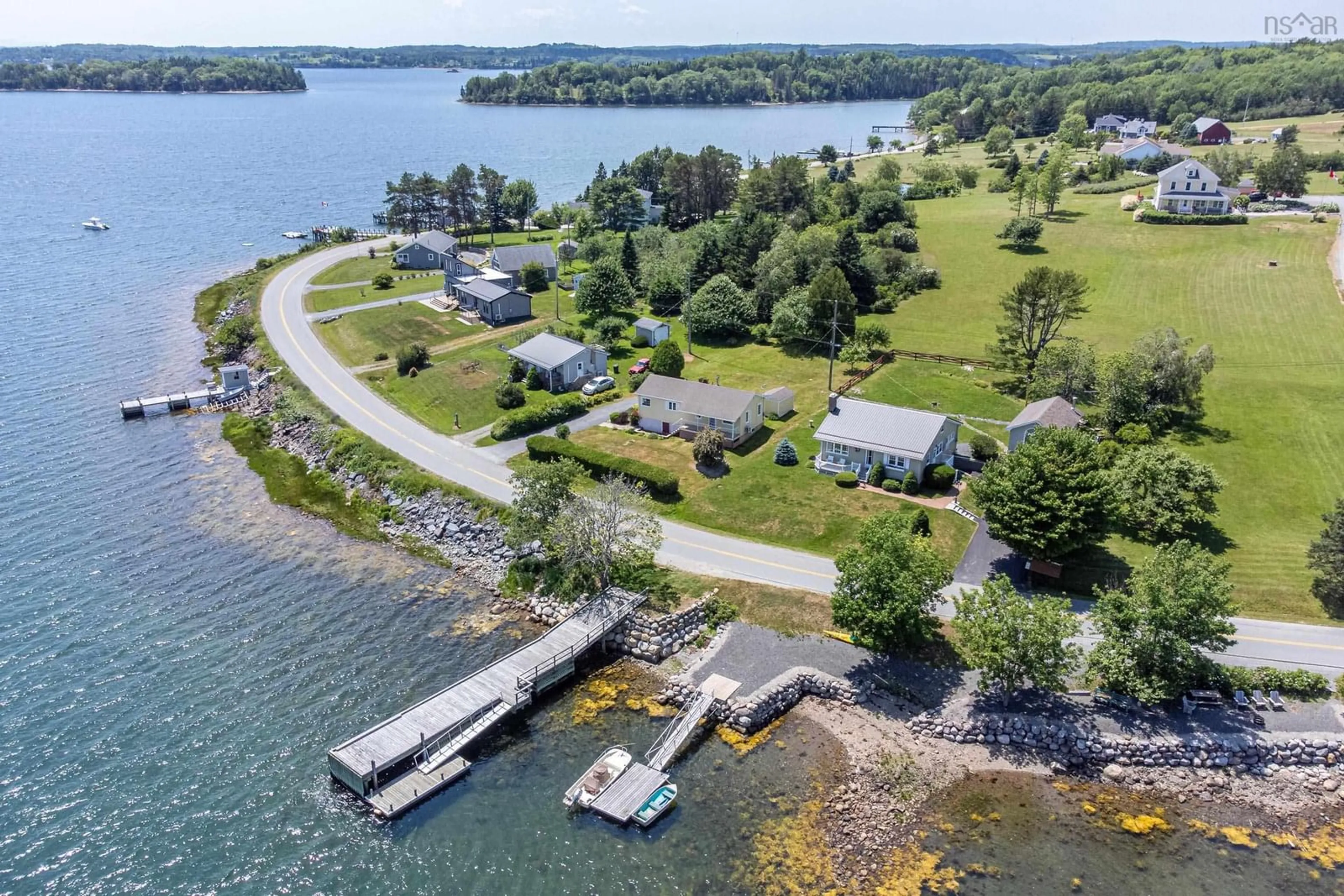 A pic from outside/outdoor area/front of a property/back of a property/a pic from drone, water/lake/river/ocean view for 698 Oakland Rd, Indian Point Nova Scotia B0J 2E0