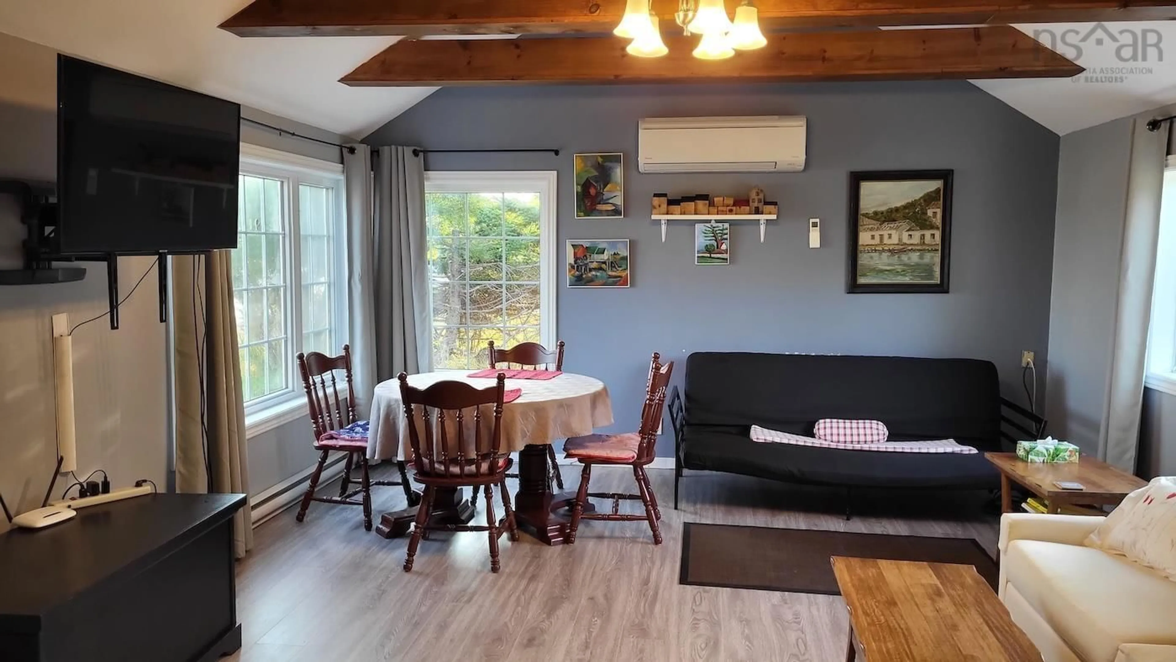 Dining room, wood/laminate floor for 34 Wharf Rd, Bush Island Nova Scotia B0R 1C0