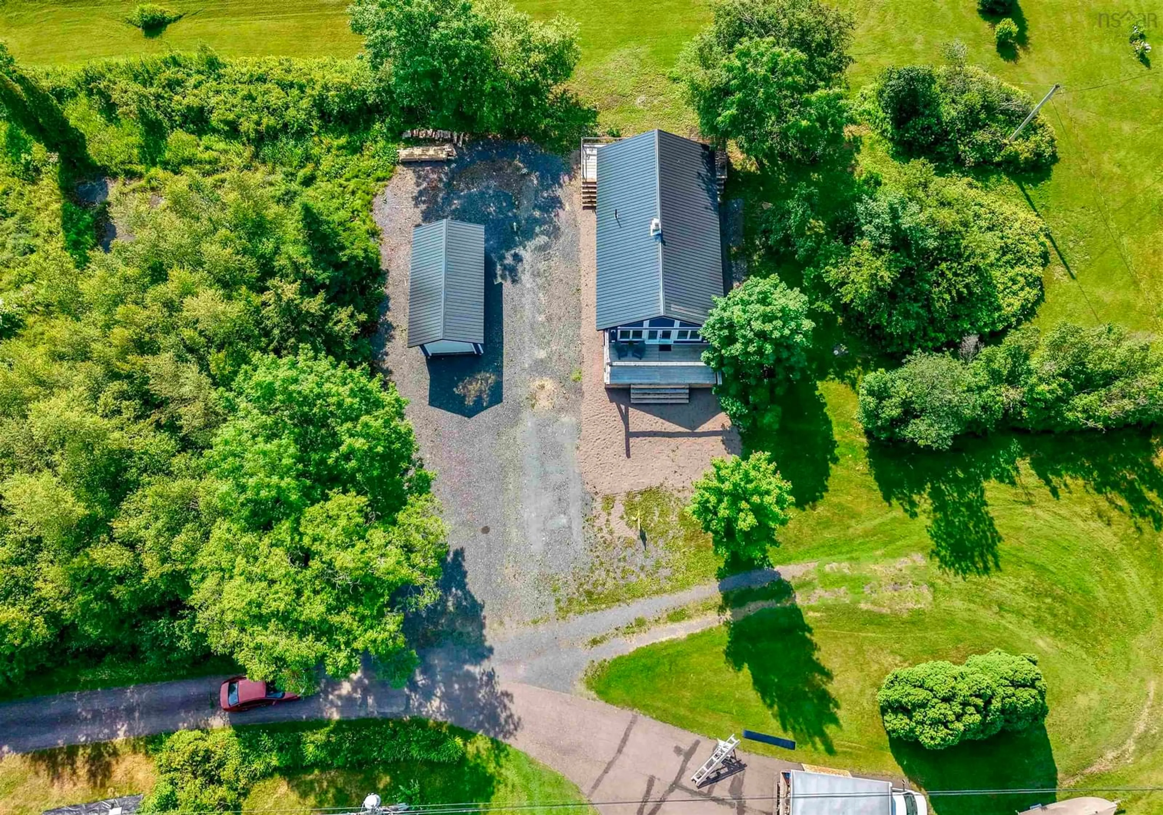A pic from outside/outdoor area/front of a property/back of a property/a pic from drone, unknown for 15 Birch Lane, Pictou Landing Nova Scotia B0K 1X0