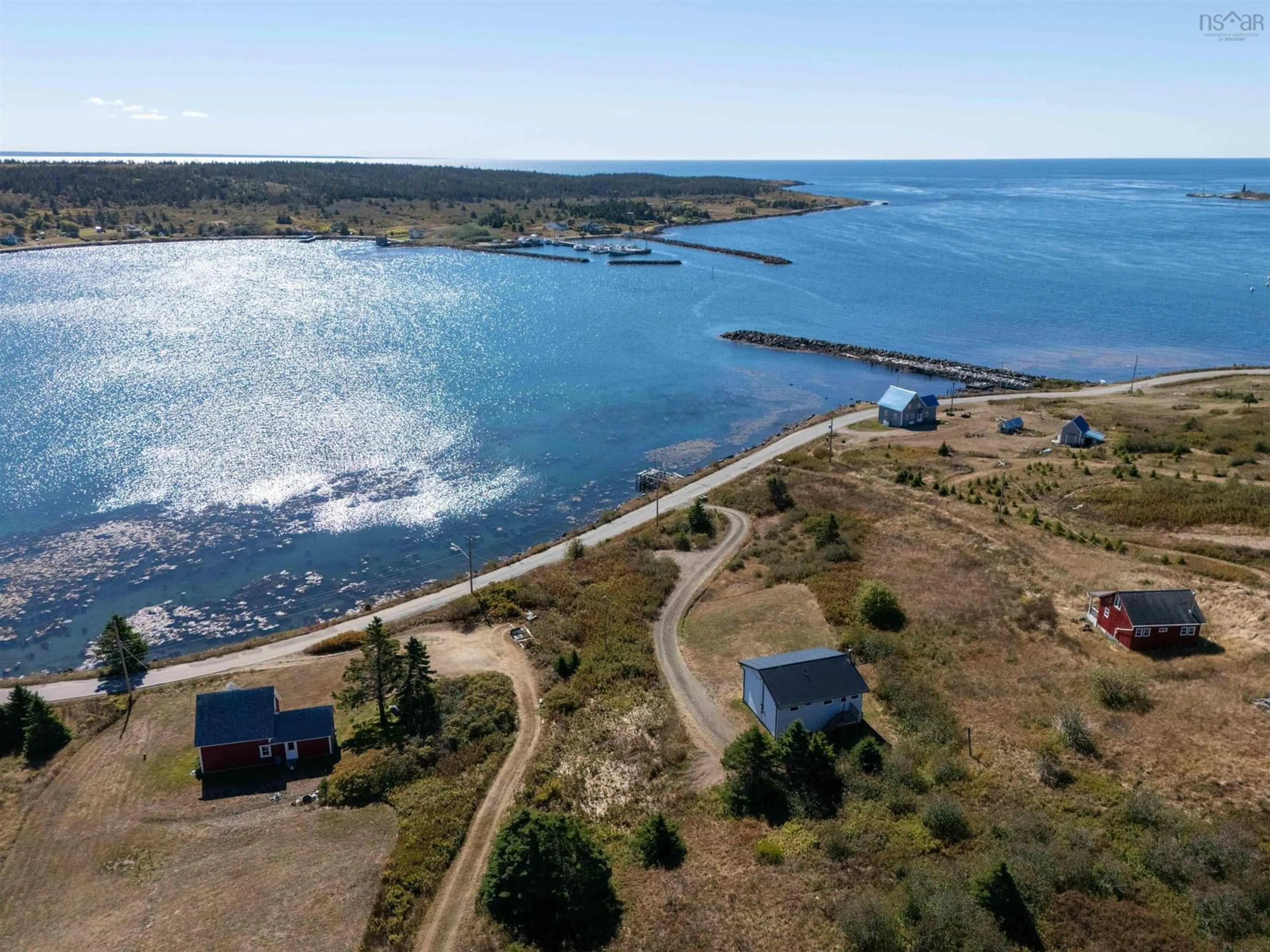 A pic from outside/outdoor area/front of a property/back of a property/a pic from drone, water/lake/river/ocean view for 113 Water Street, Freeport Nova Scotia B0V 1B0