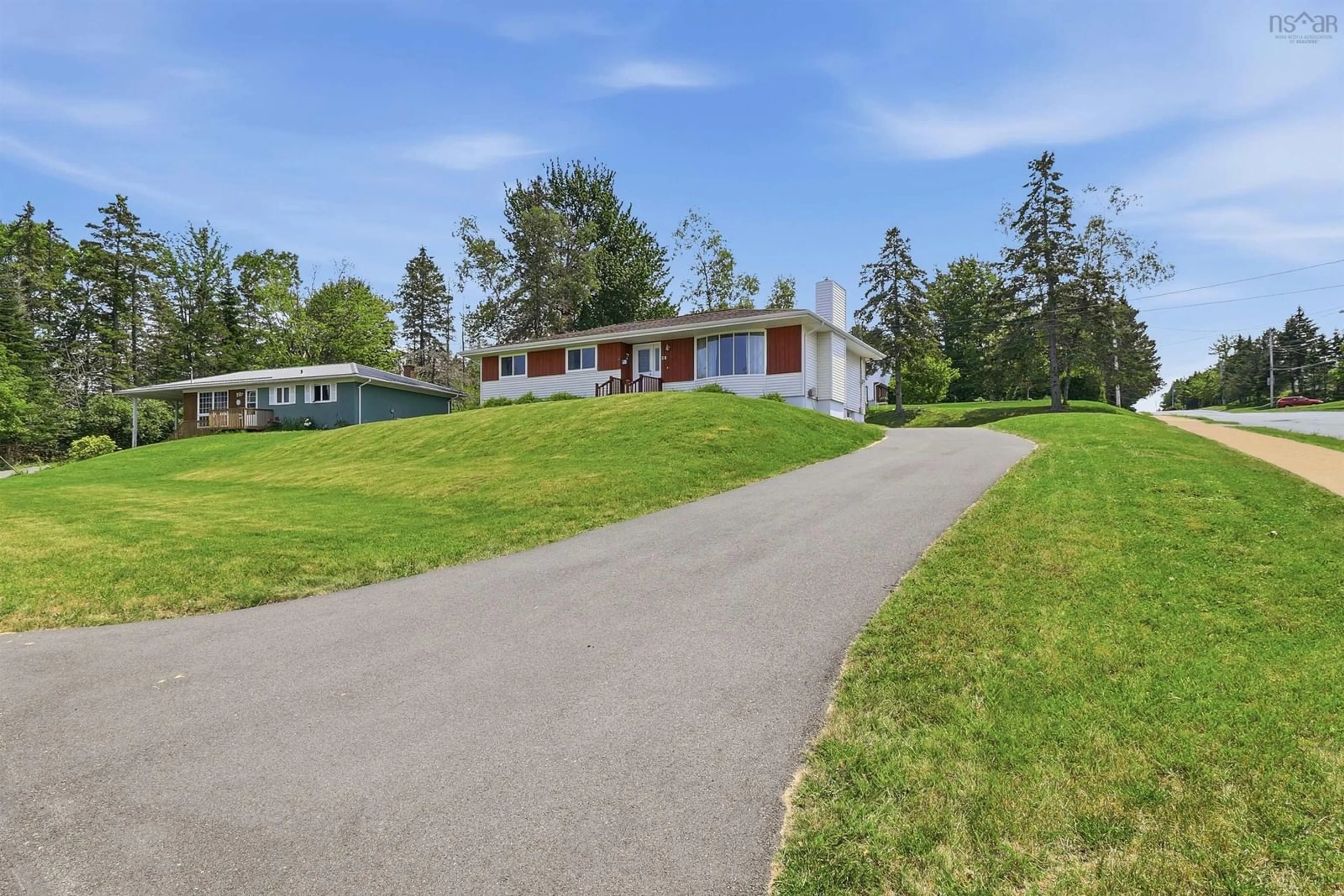 A pic from outside/outdoor area/front of a property/back of a property/a pic from drone, unknown for 28 Evergreen Crt, Salmon River Nova Scotia B2N 5H9
